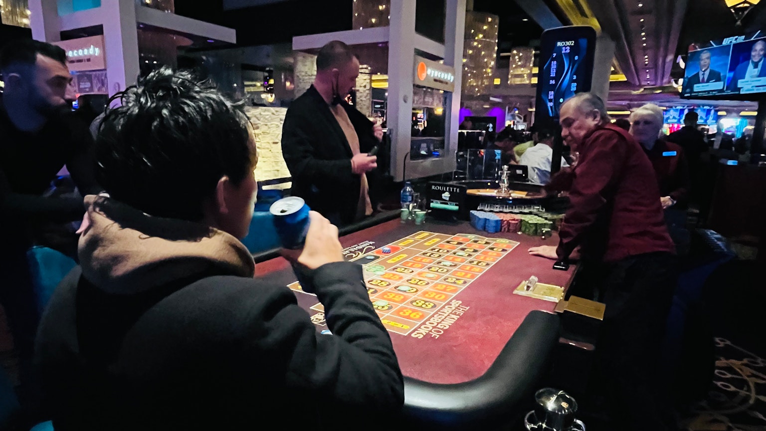 Scene of players enjoying a game at a casino table