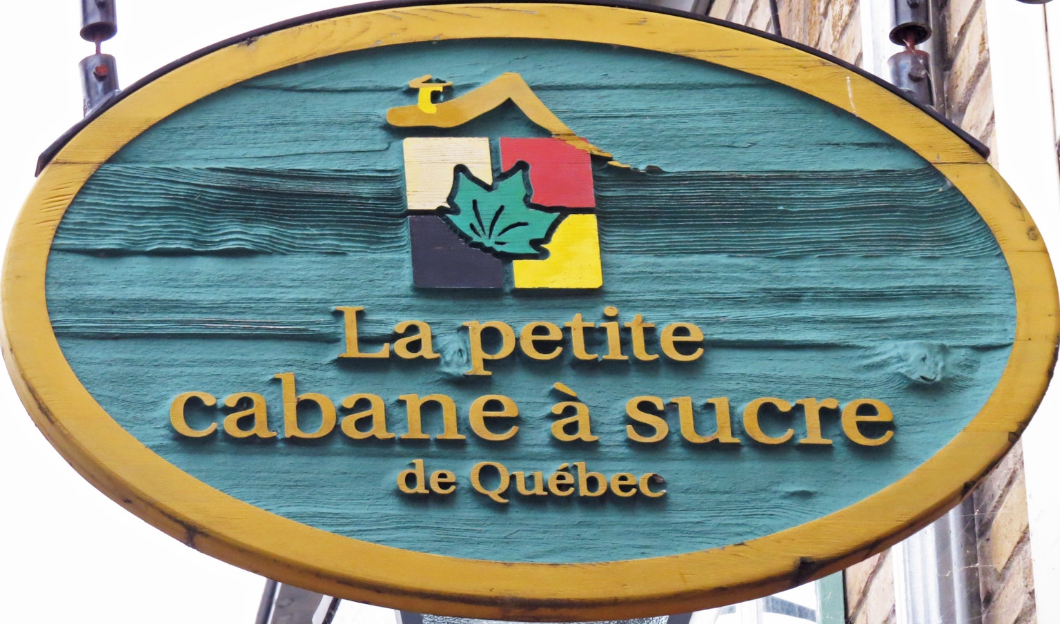 Cartel de La Petite Cabane à Sucre en Quebec con diseño colorido