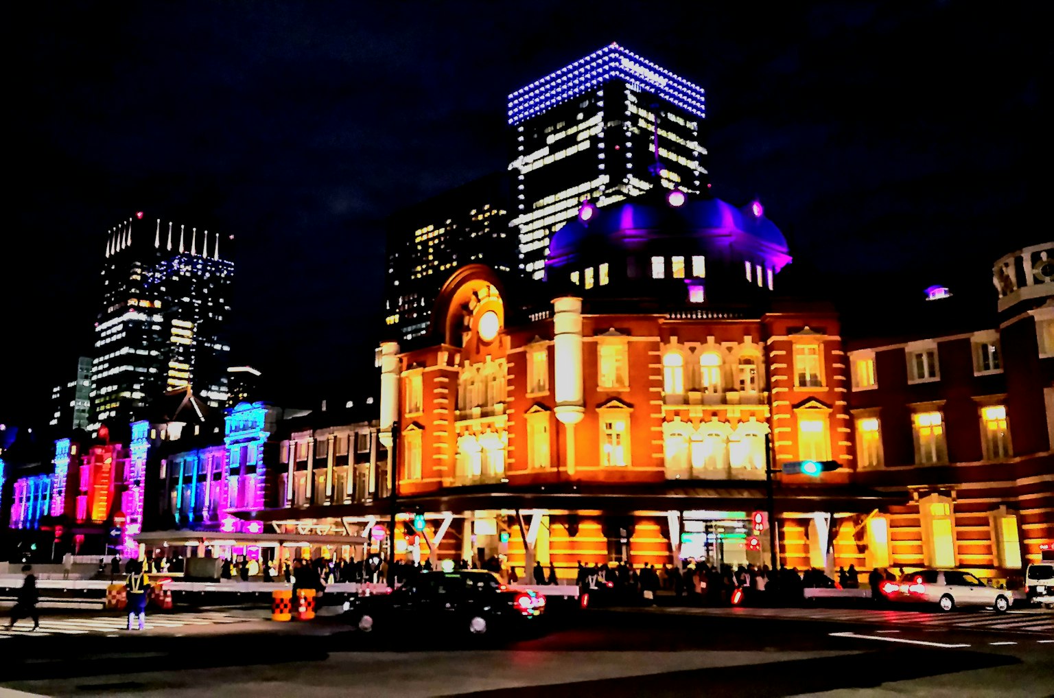 Night view of Tokyo Station with colorful illuminated buildings