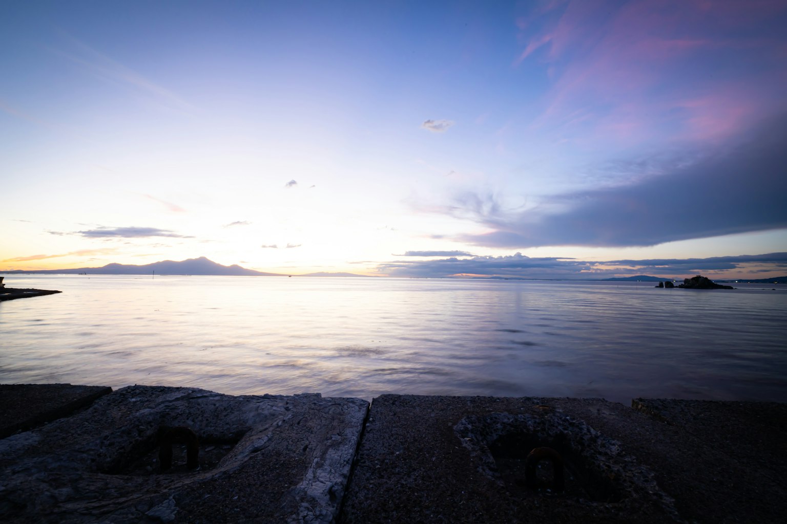 Serene seascape with sunset sky