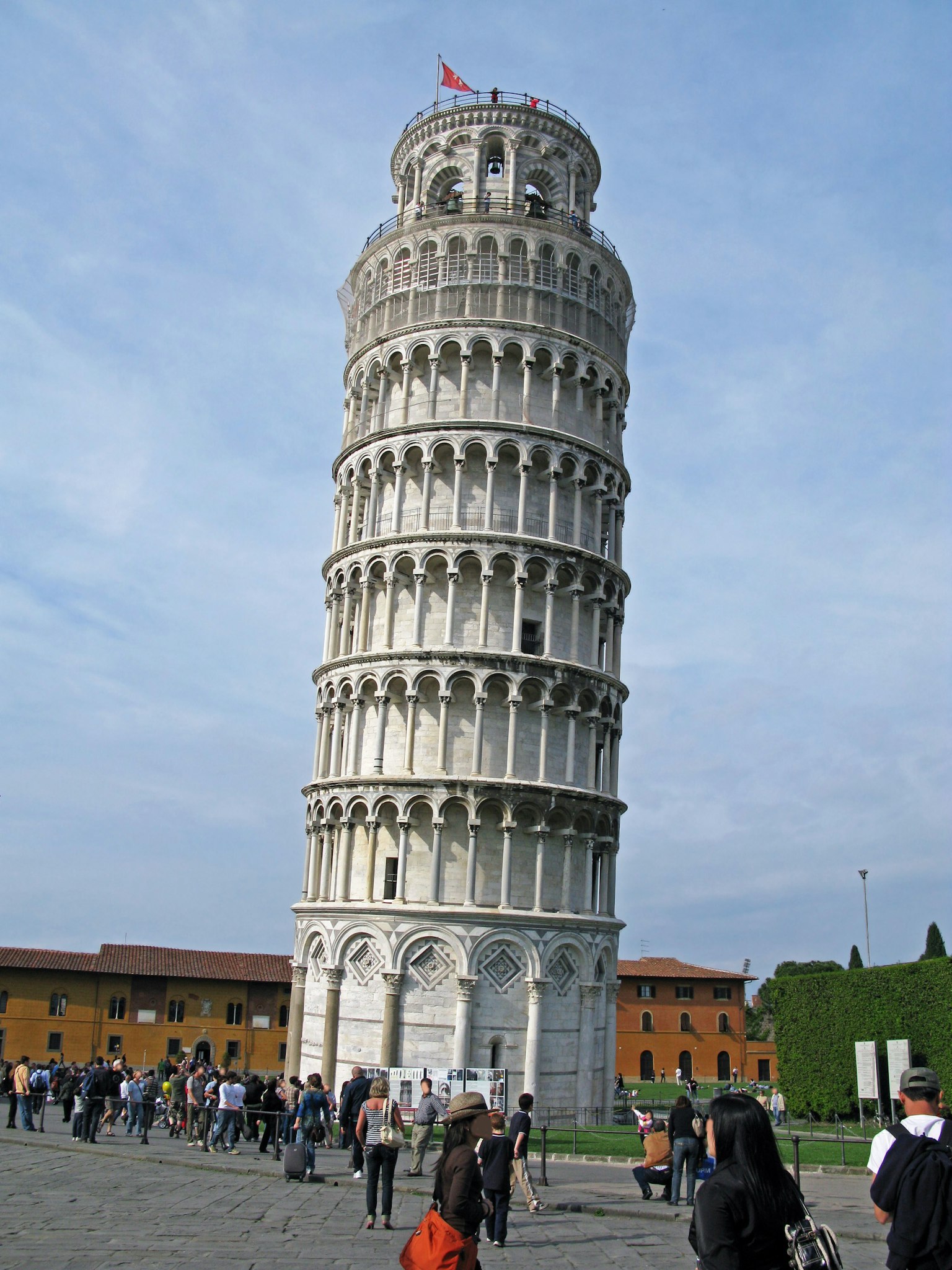 Leaning Tower of Pisa with tourists in the square