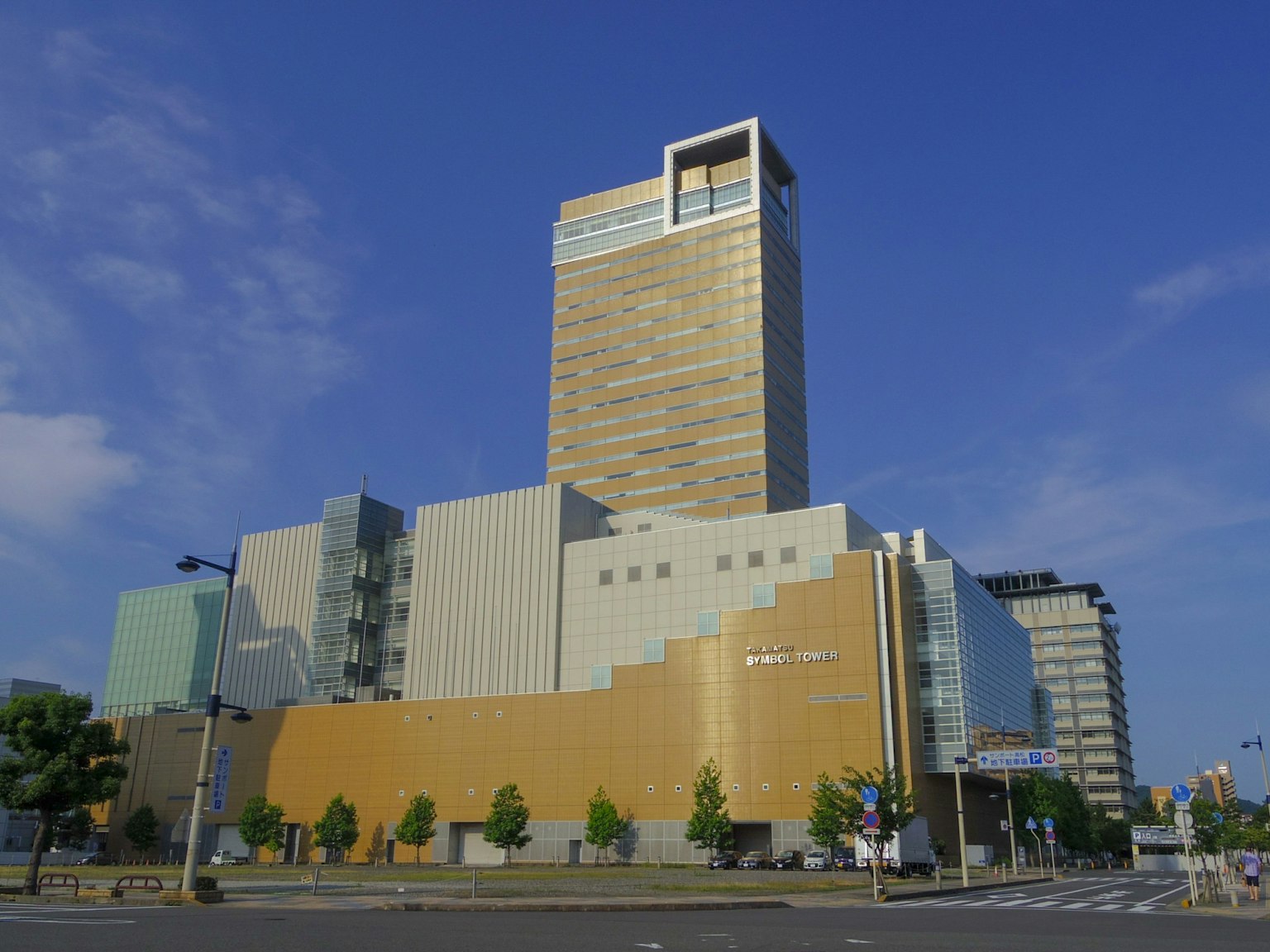 Modern architecture featuring a tall building and unique facades