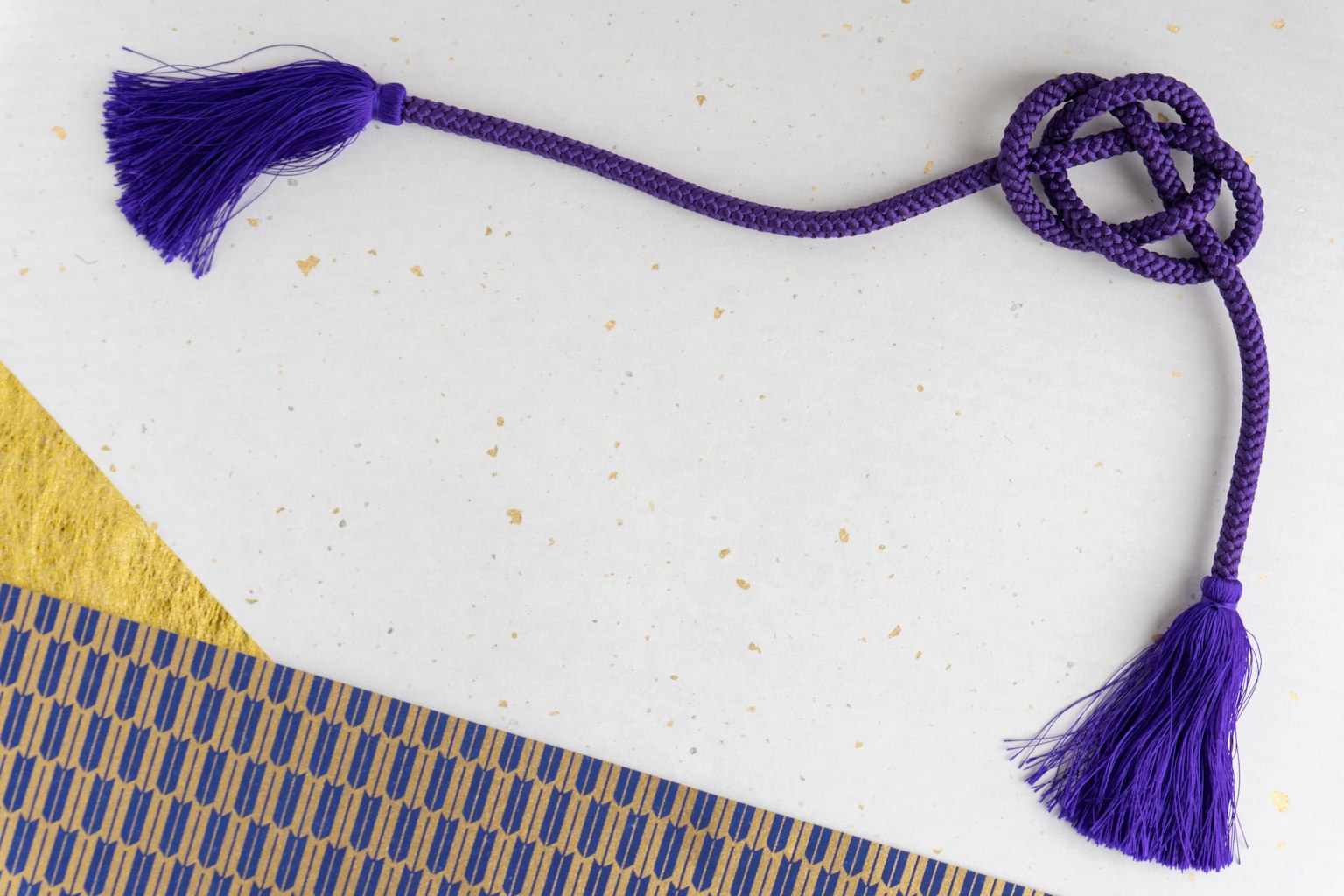 Purple tassel knot design with unique texture