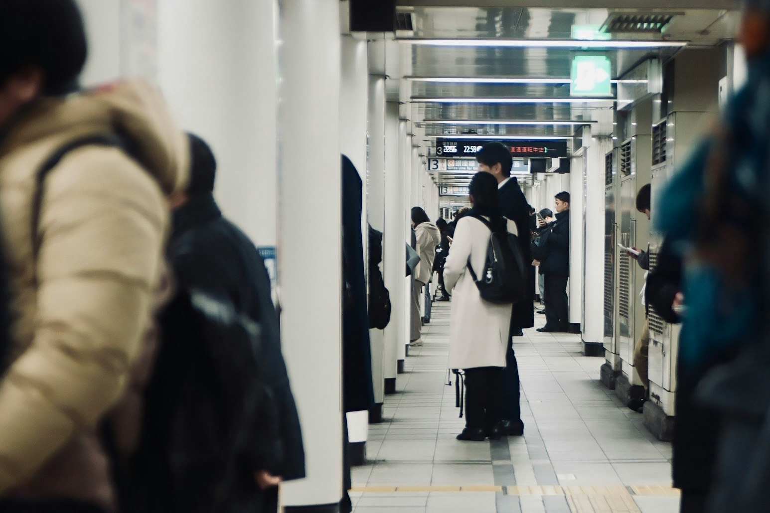 shopping alley walkway with people and shopping bags