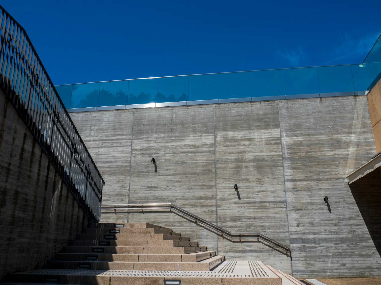 Modern architectural space with concrete walls and steps