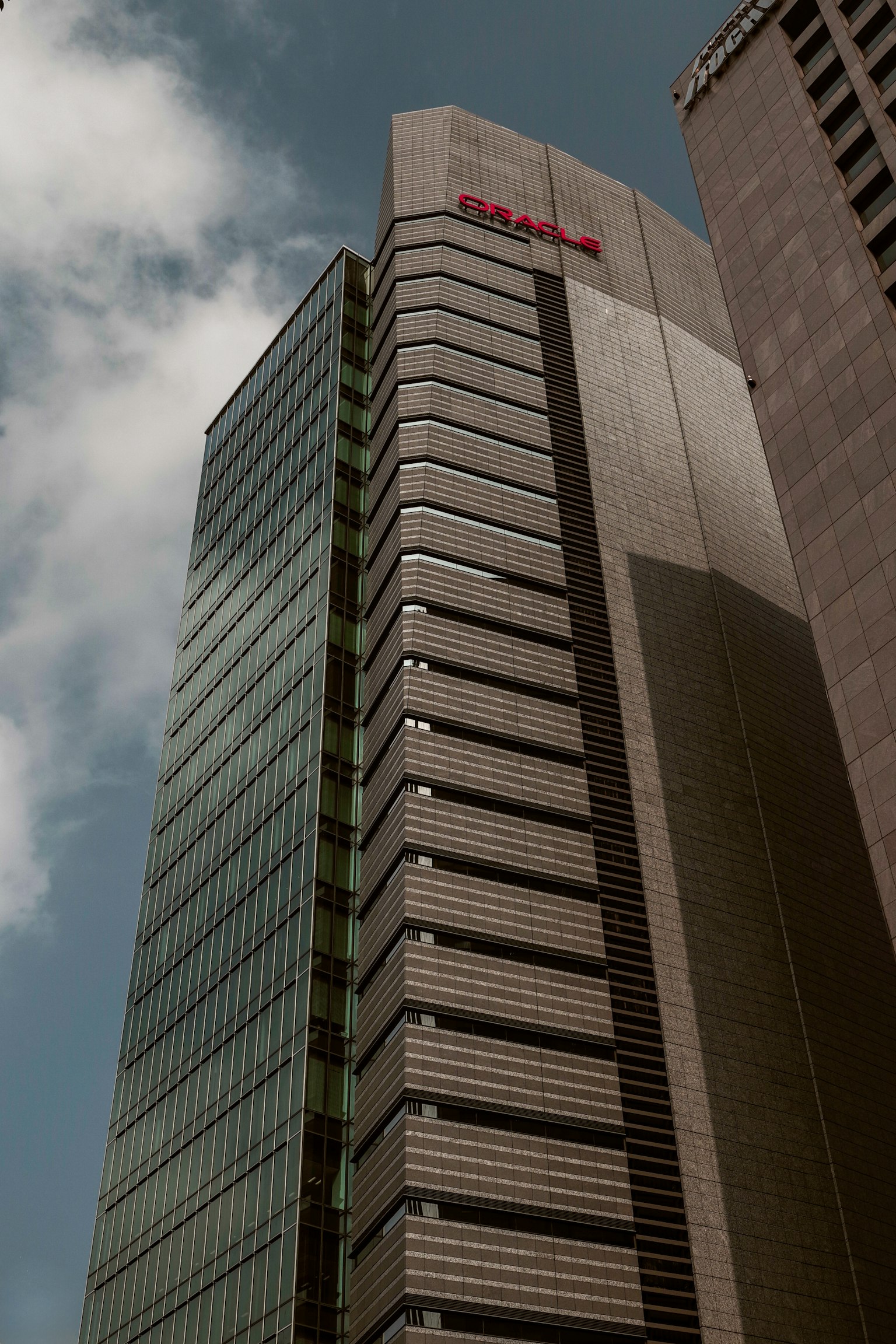 Facade of a tall building with a blue sky background