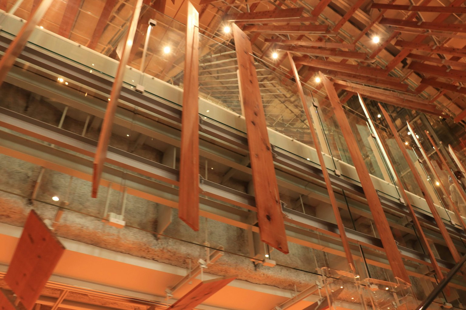Interior of a modern building featuring wooden and metal elements