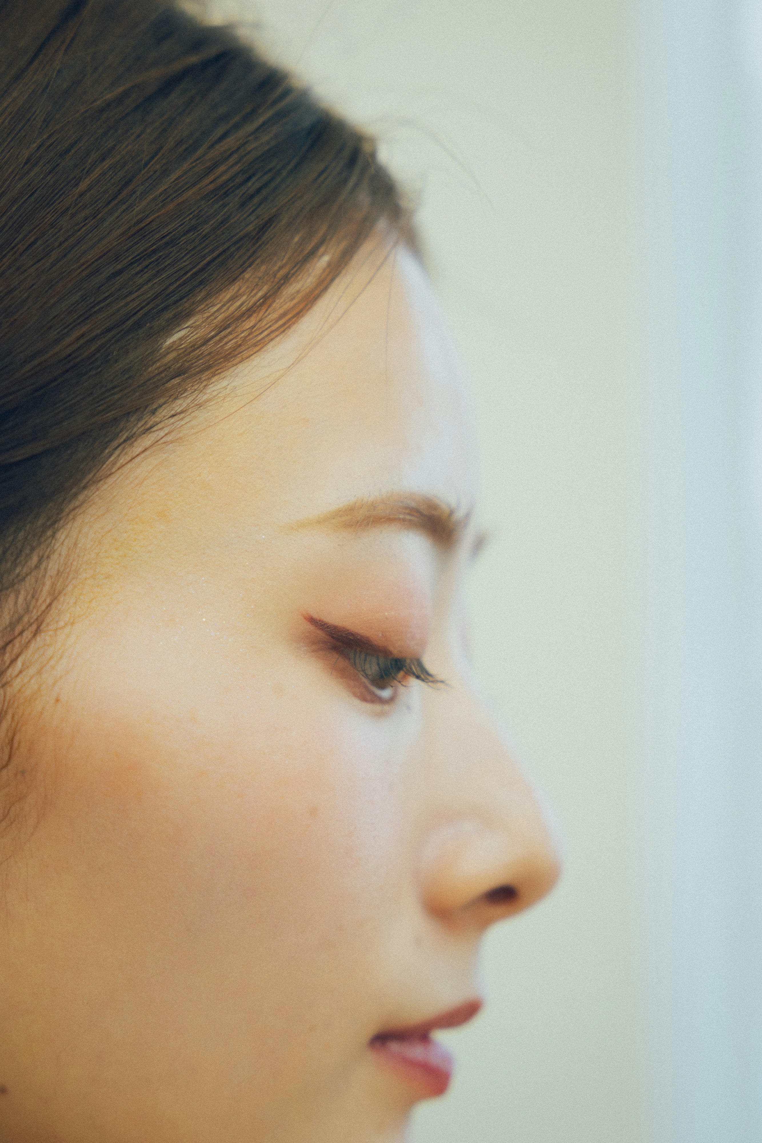 close-up side profile of a woman