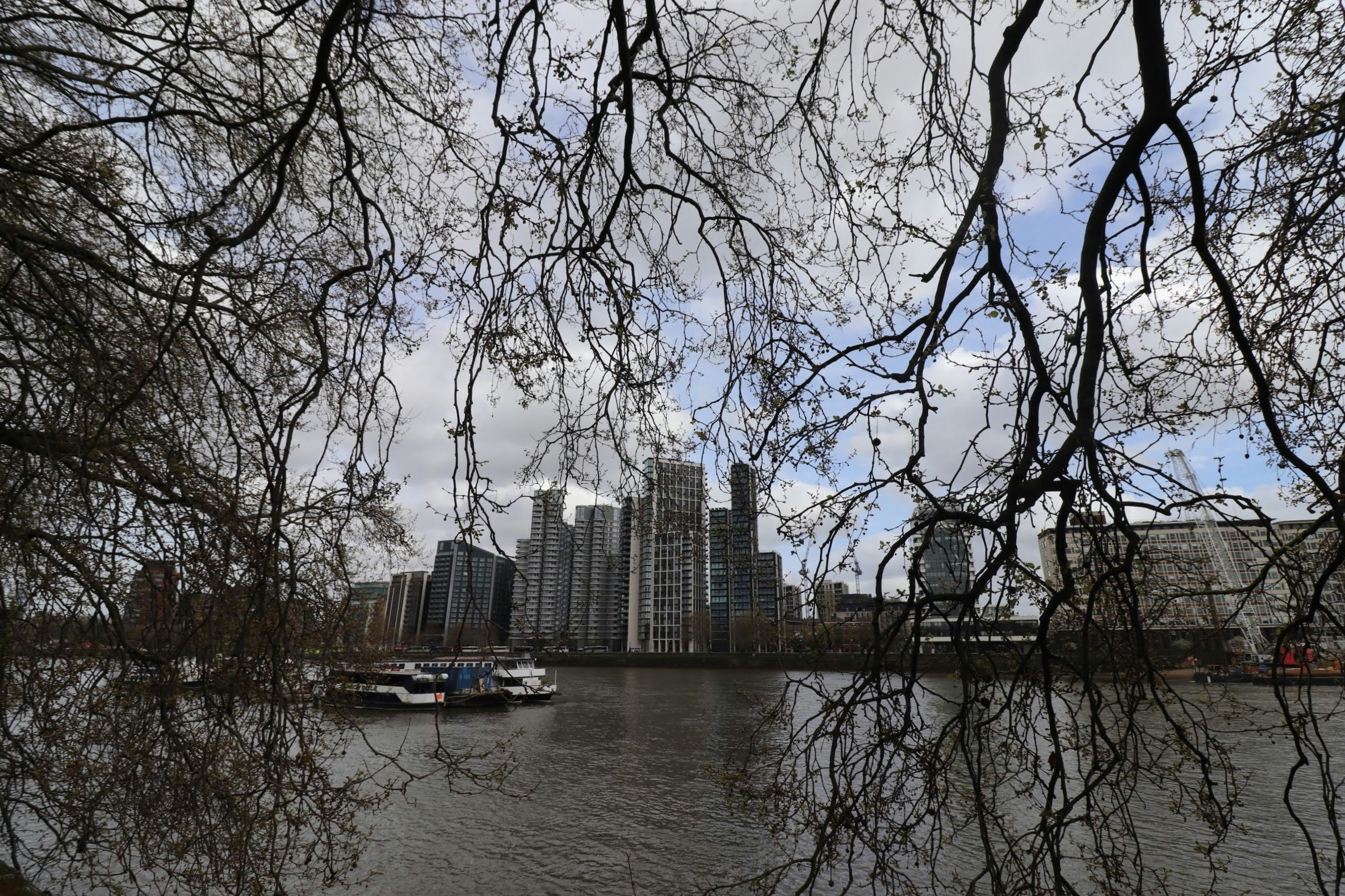 winter riverside city skyline with high-rise buildings