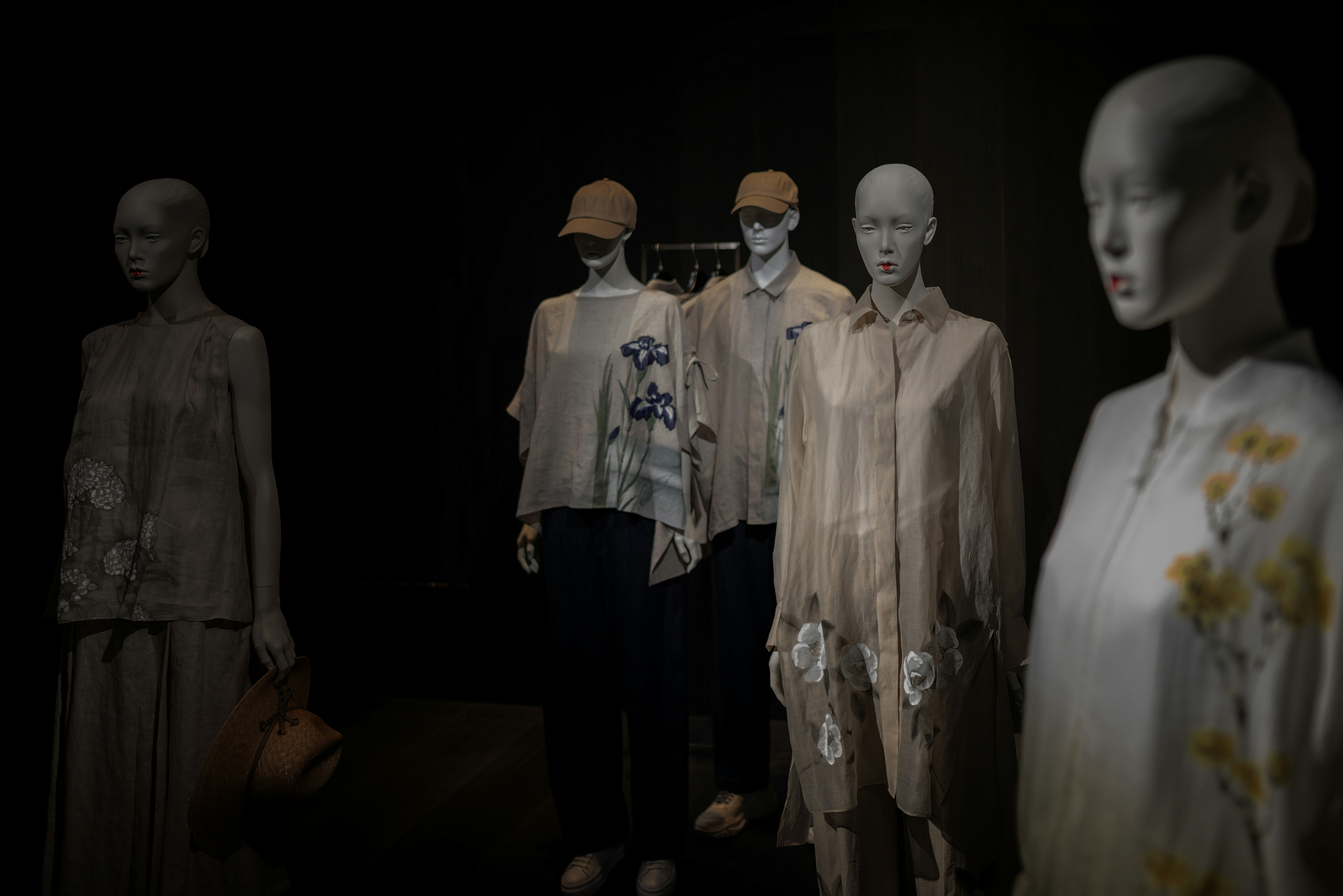 street snap of mannequins lined up in a display space