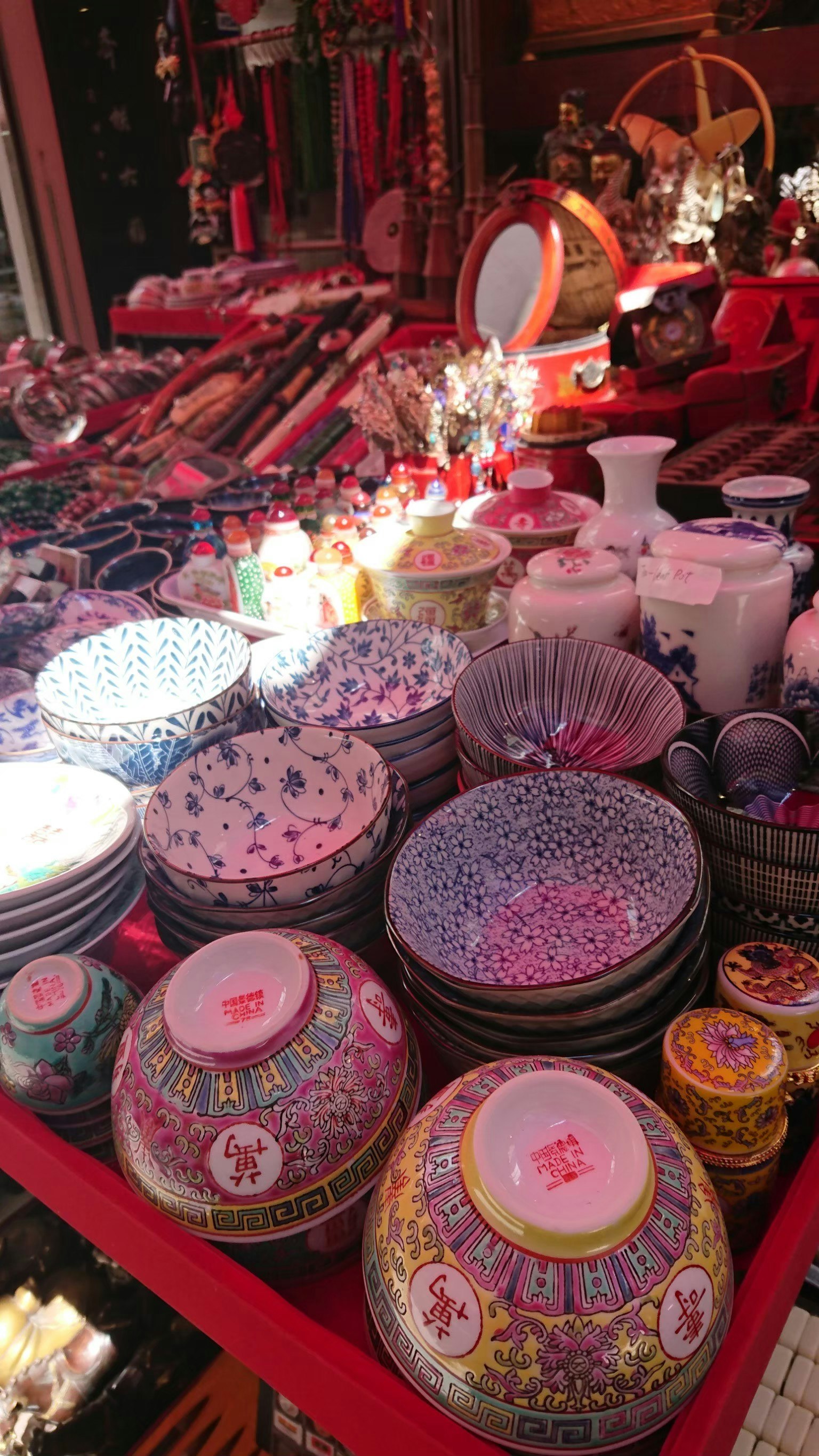 Colorful pottery displayed at a market