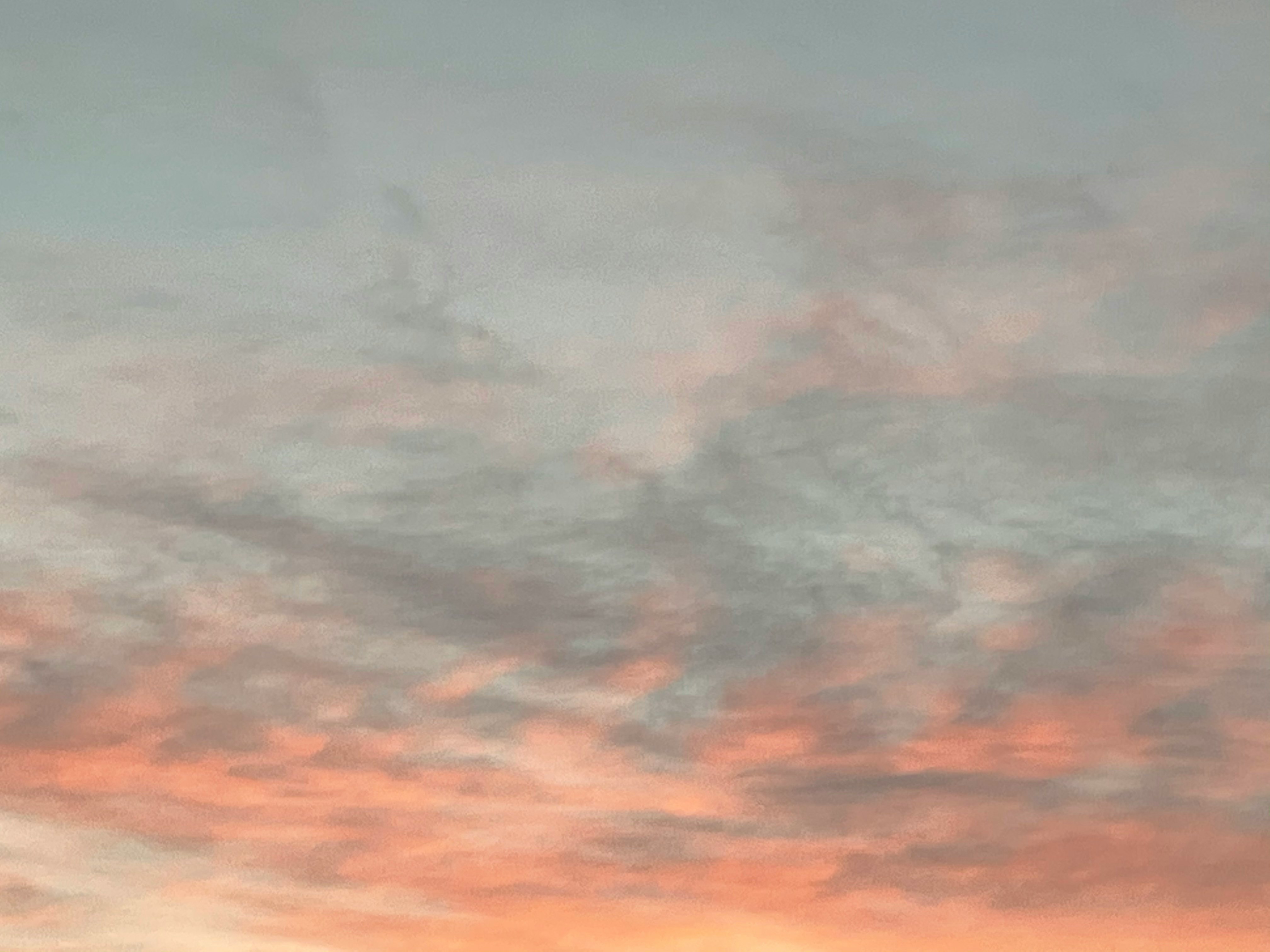 captivating evening sky with clouds and soft orange tones