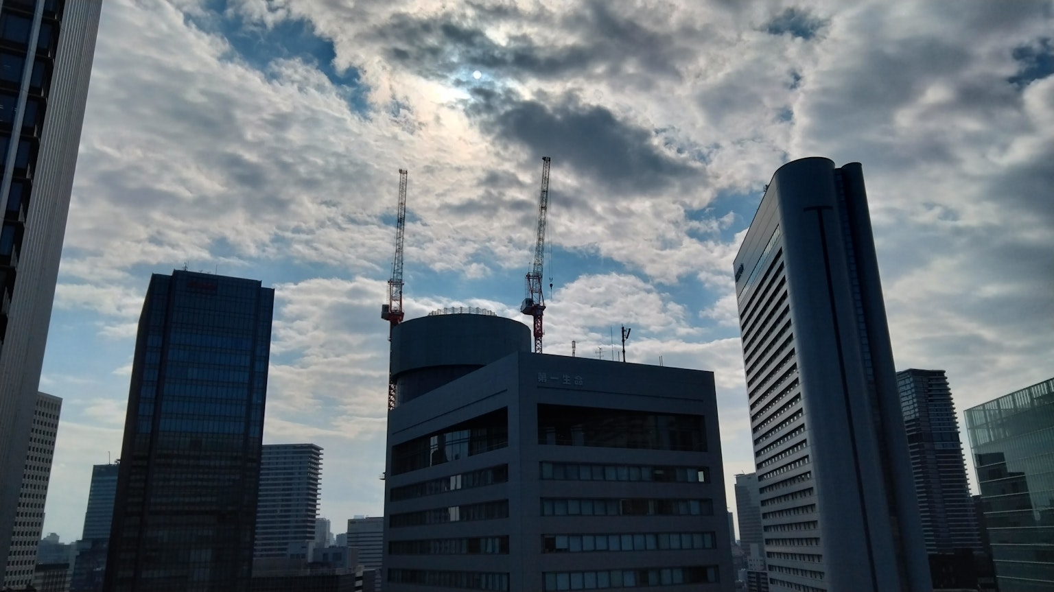 Tokyo skyline with buildings and cloudy sky