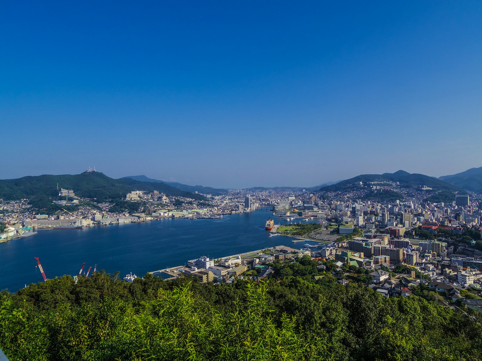 Panoramic view of Nagasaki with blue sky and cityscape