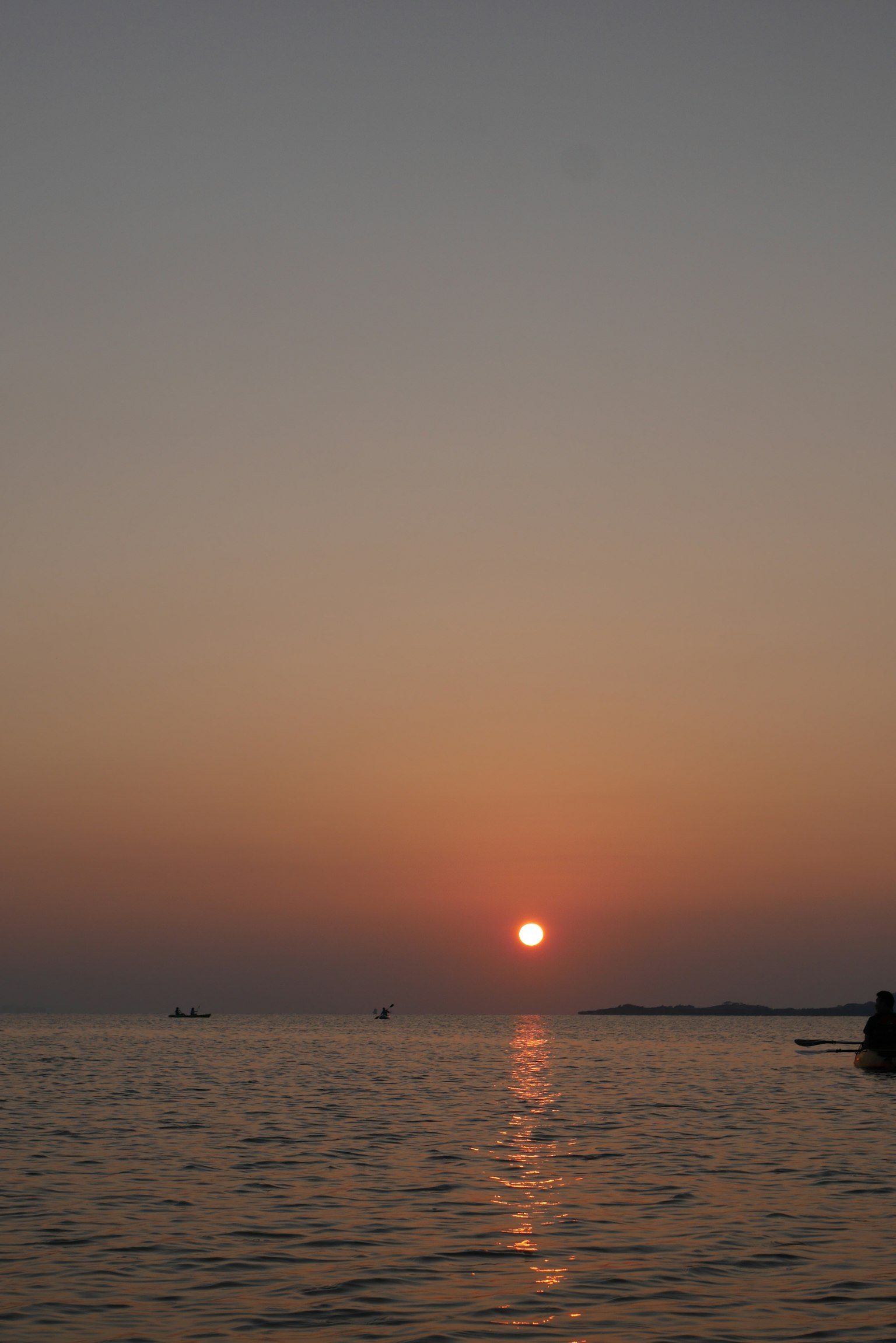 Beautiful seascape with sunset reflecting on the water