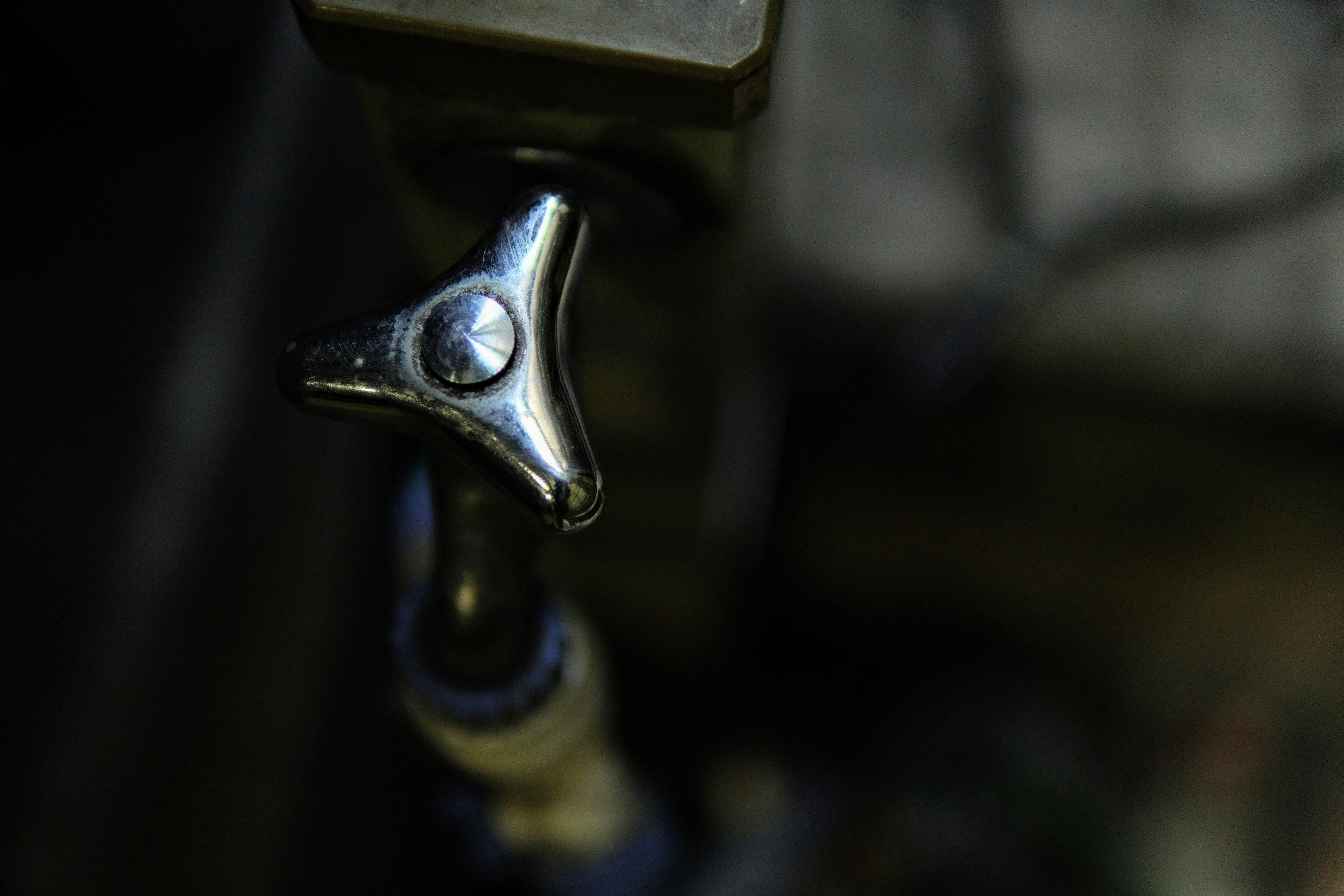 close-up of a metal door handle and keyhole