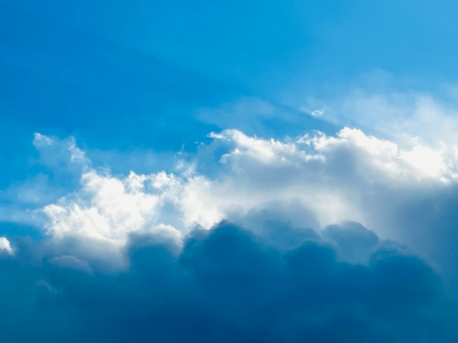 Beautiful contrast of blue sky and white clouds