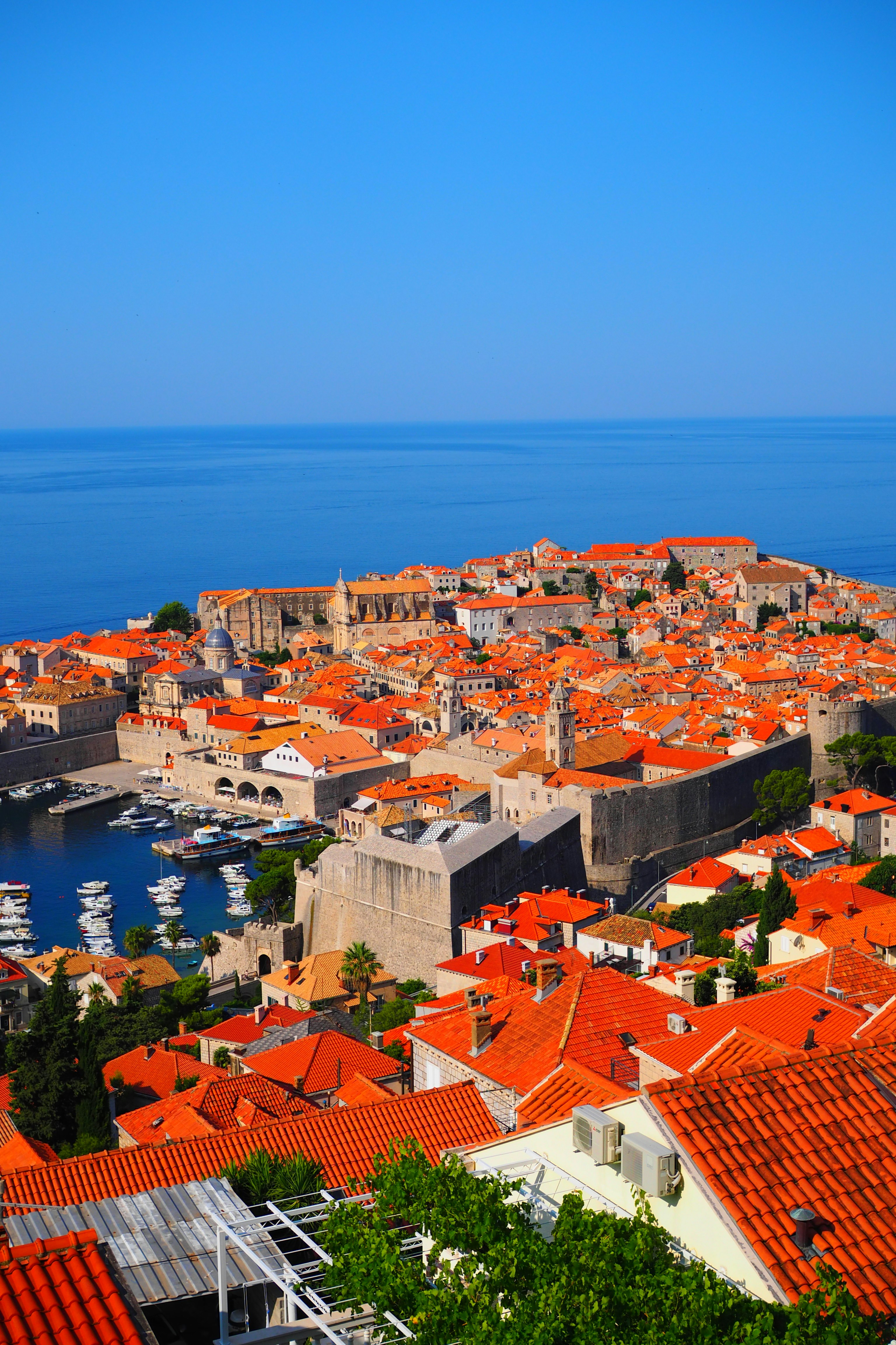 Scenic view of Dubrovnik with orange rooftops overlooking the Adriatic Sea