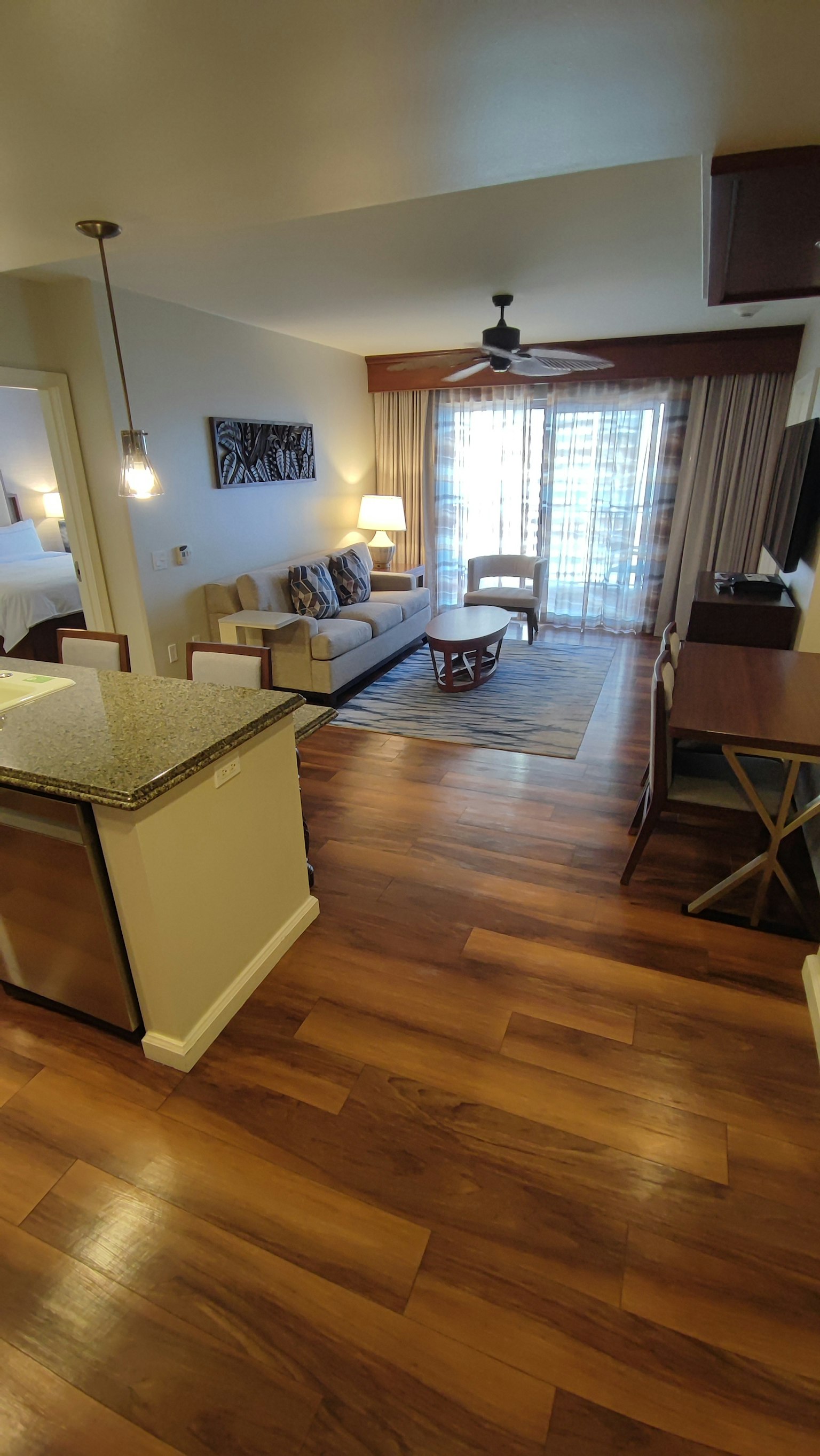 Interior of an apartment featuring a bright living room and dining area