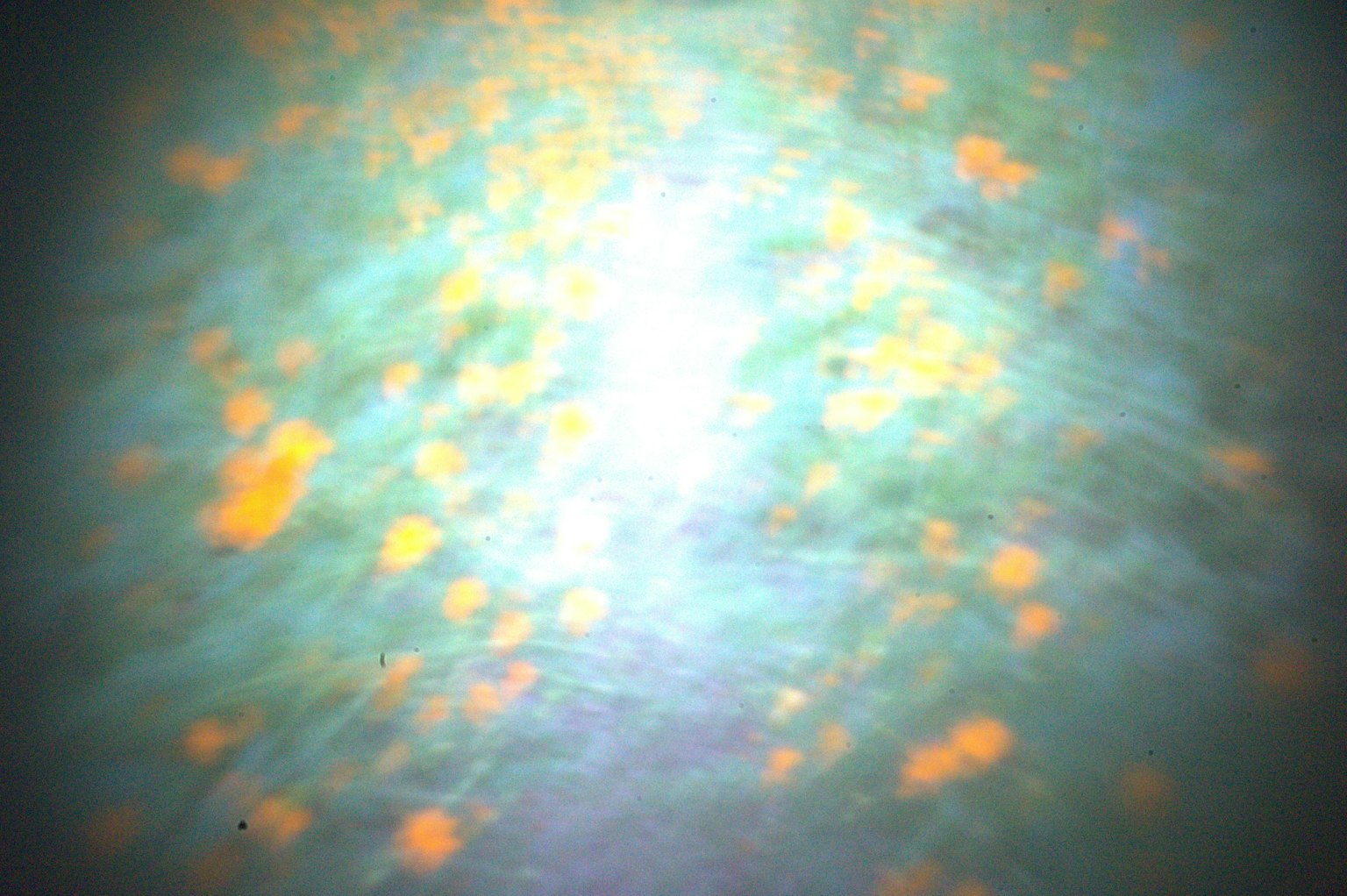 Nền trừu tượng với các điểm sáng màu xanh và cam rải rác