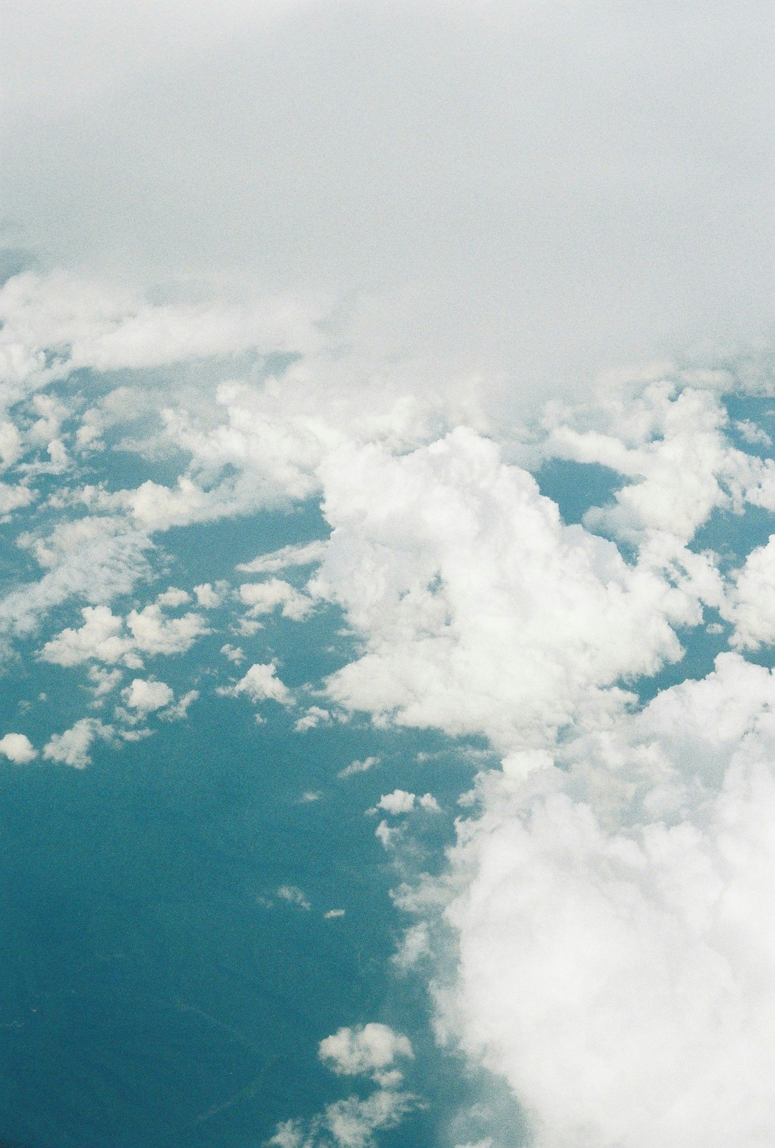 Aerial view of blue ocean and white clouds