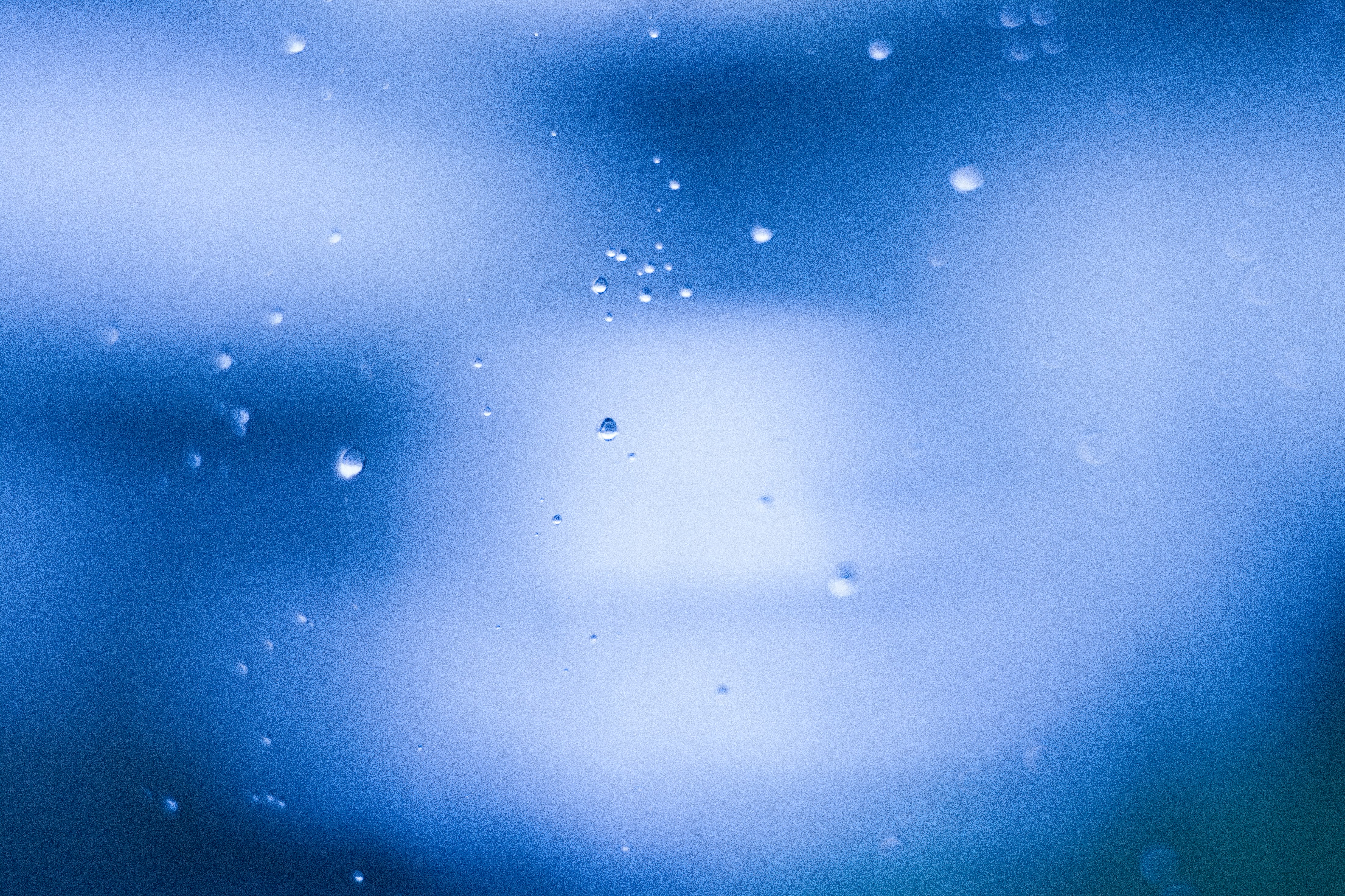 dreamy underwater blue scene with floating bubbles and particles