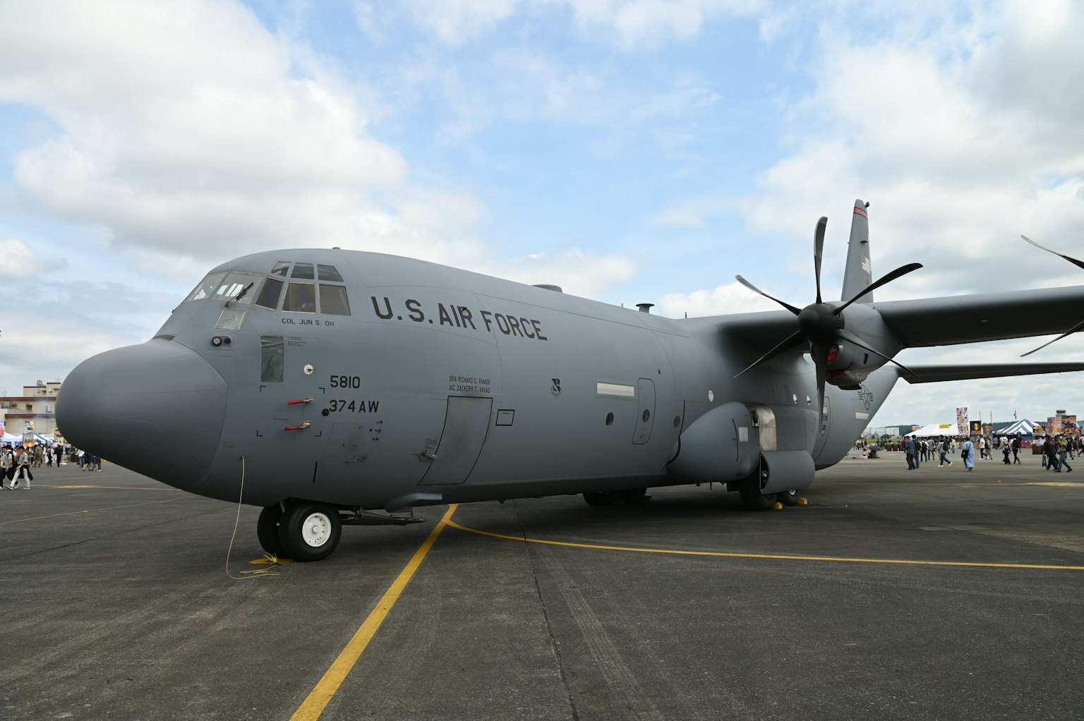 U.S. Air Force C-130 transport aircraft parked on the runway