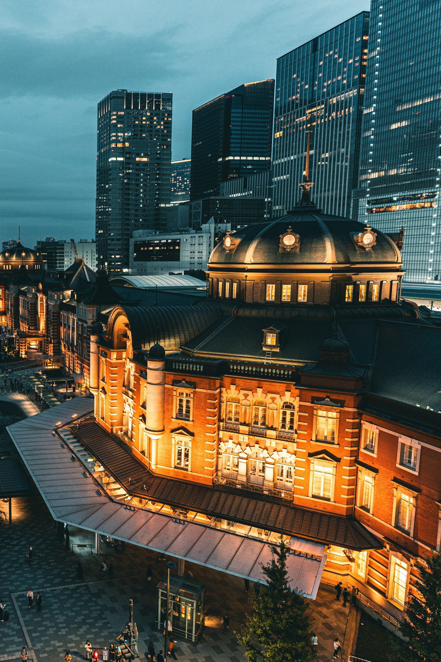 Night view of Tokyo Station with modern skyscrapers