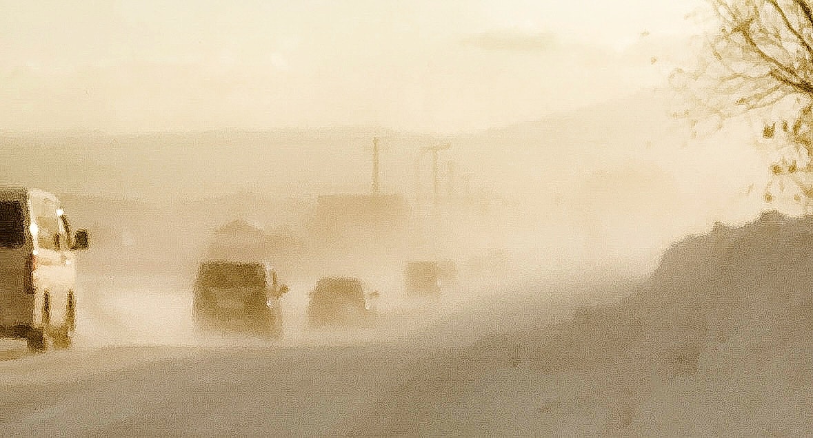 snow-foggy street scene fading into the distance