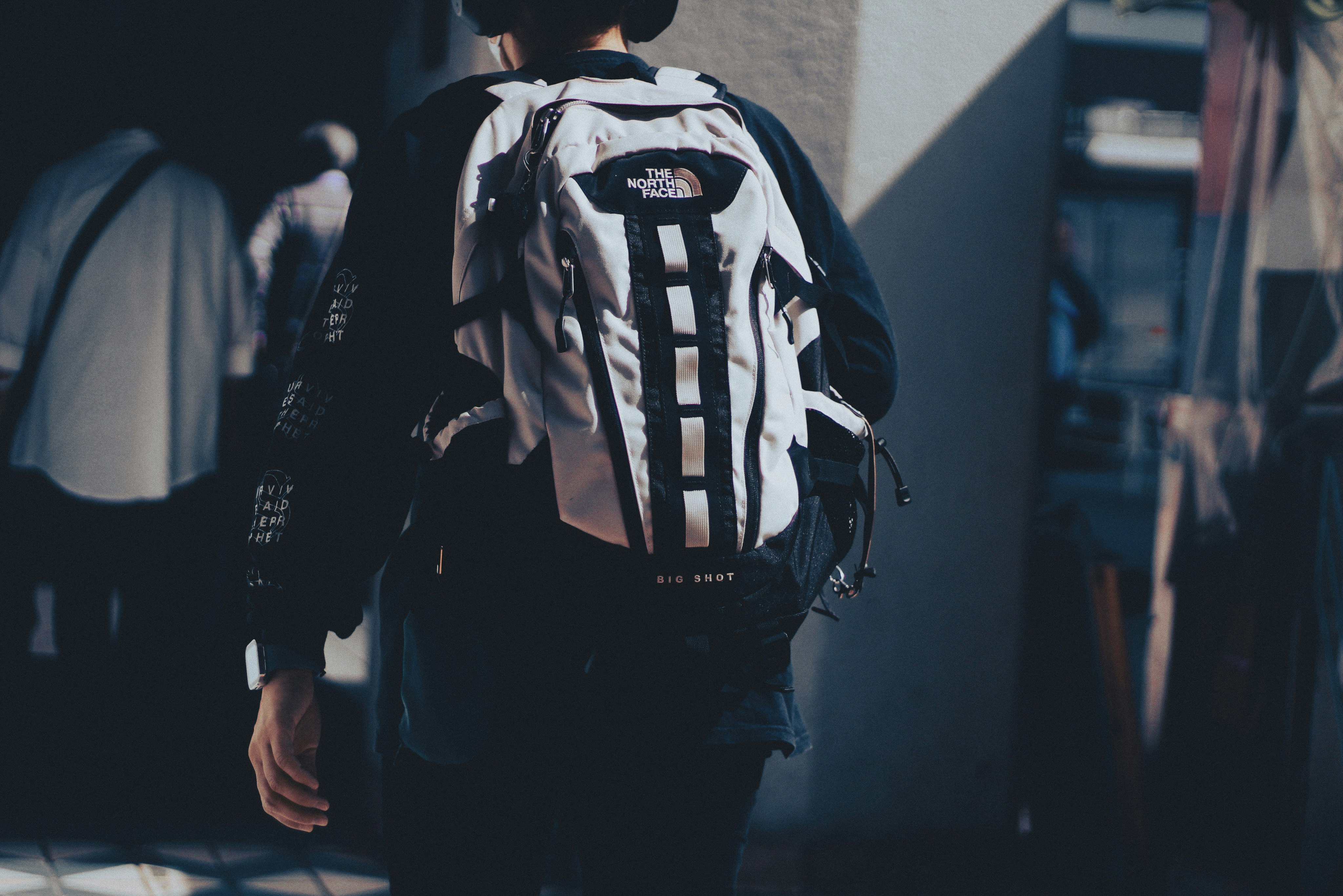 back view of a person wearing a large backpack