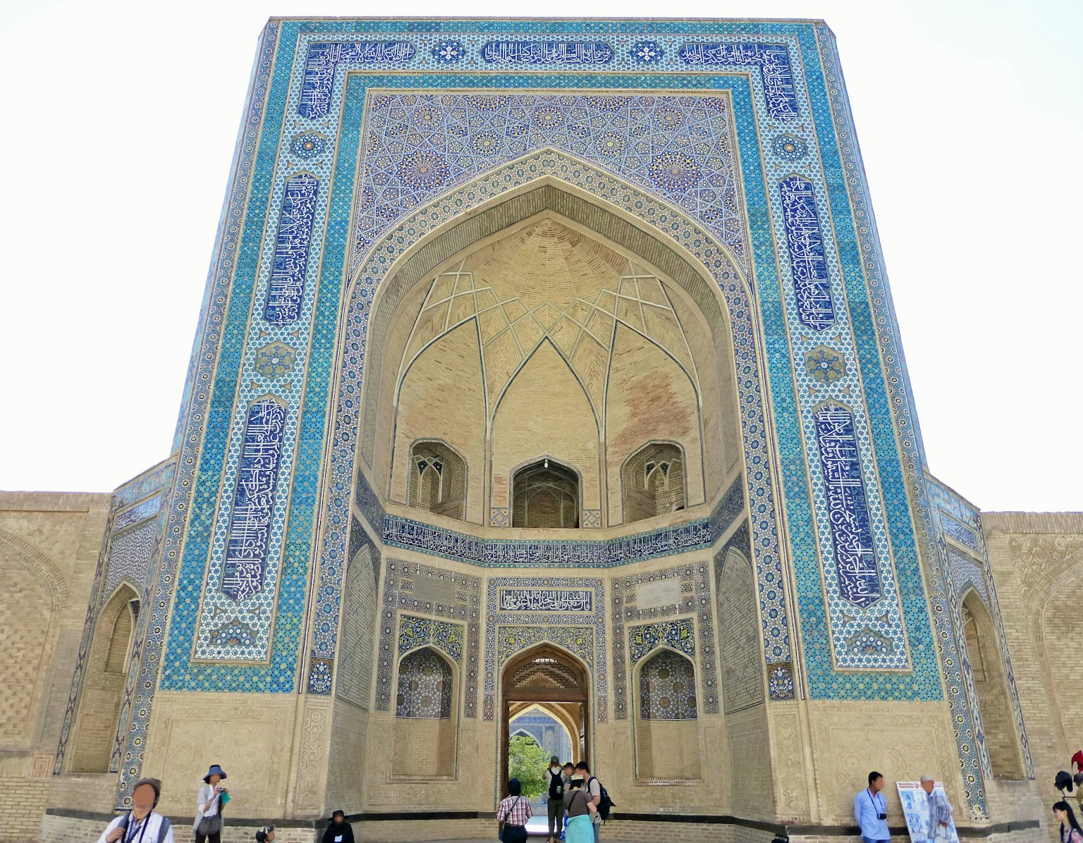 Historic building facade with vibrant tile decorations