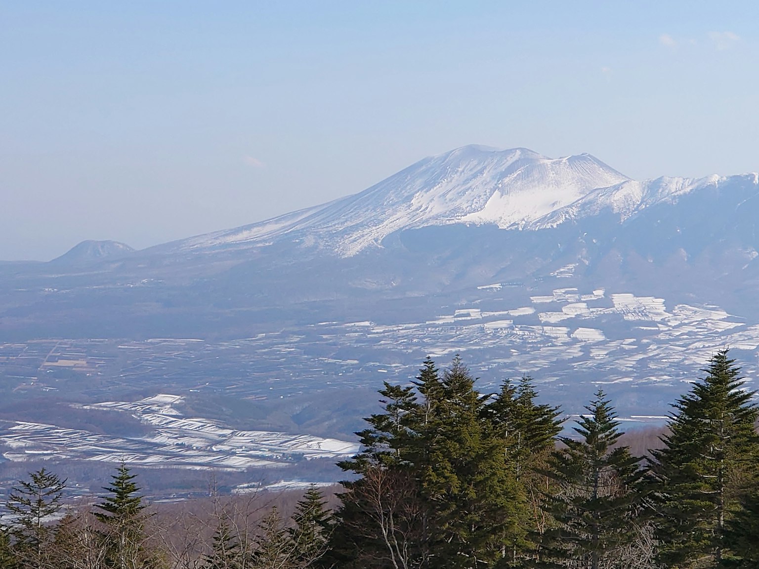 A beautiful mountain landscape covered in snow