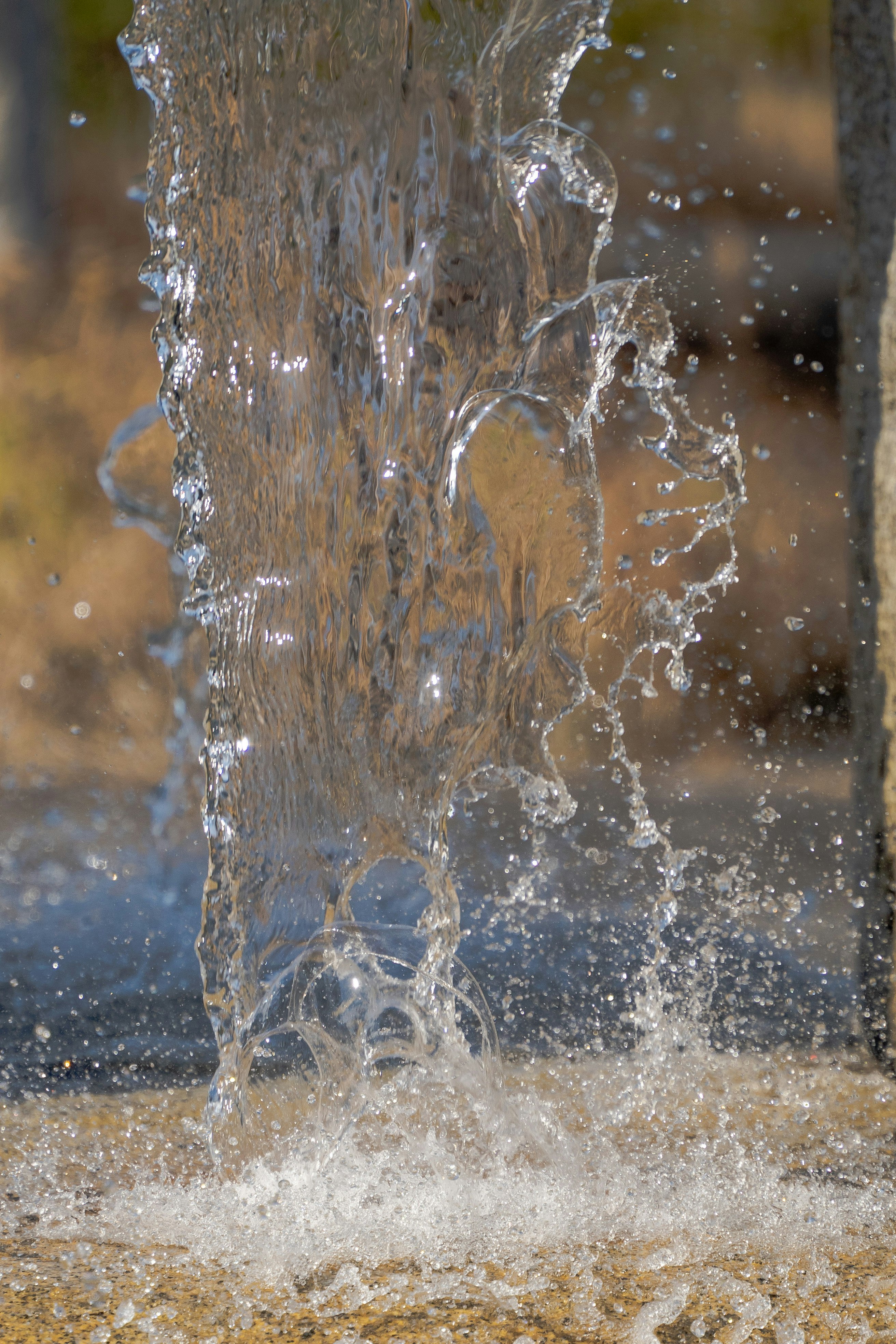 close-up of a rushing water stream with splashes