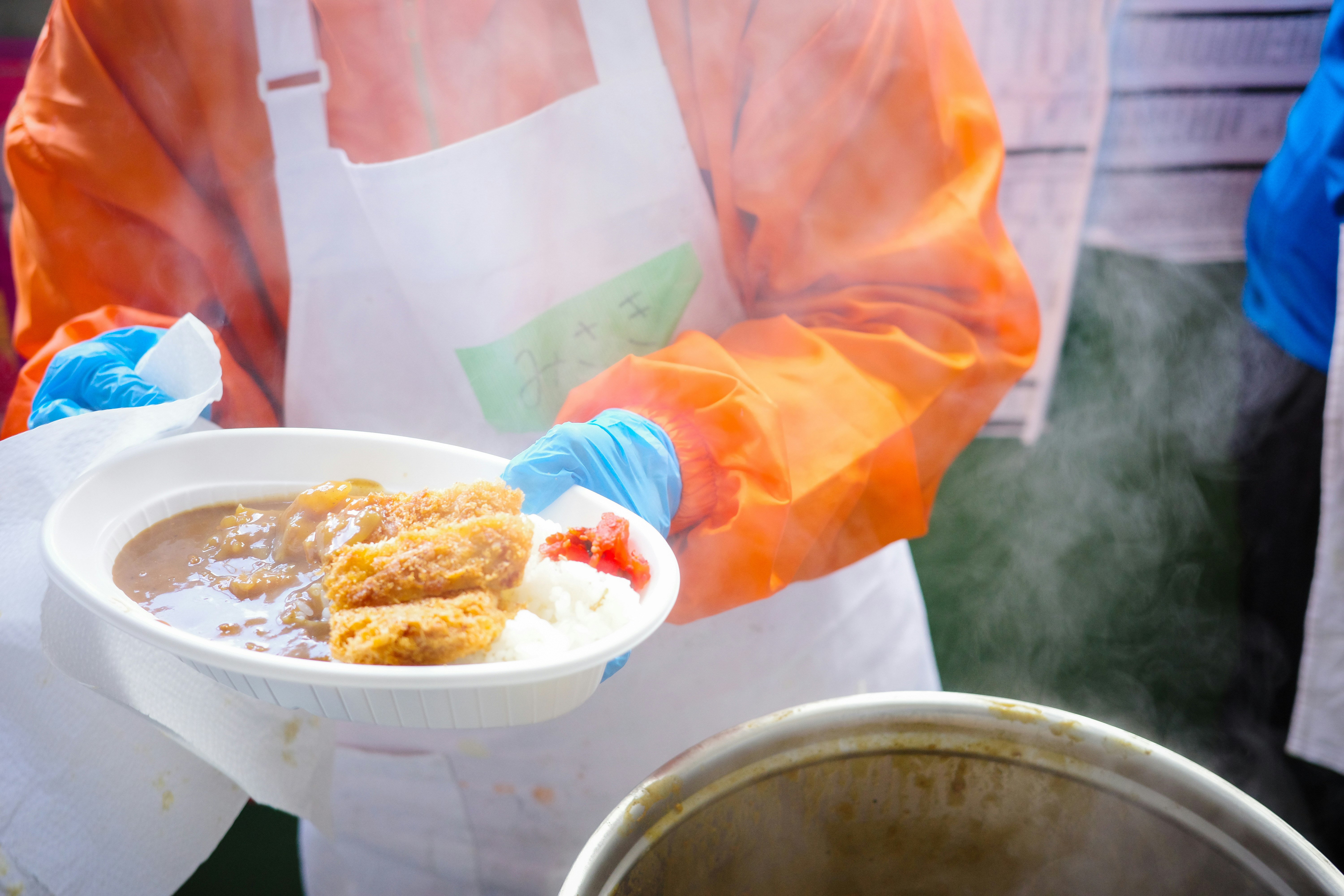 Food served in a bowl at a community meal