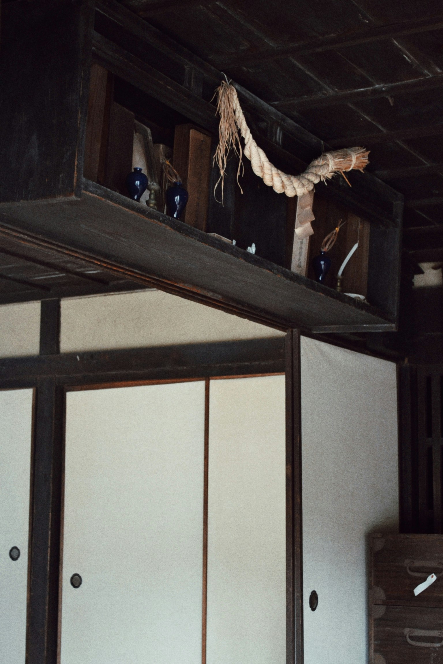 Interior of a traditional Japanese room featuring shelves and storage