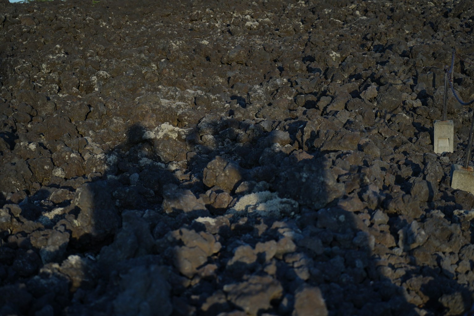 Landscape of volcanic rocks with shadows