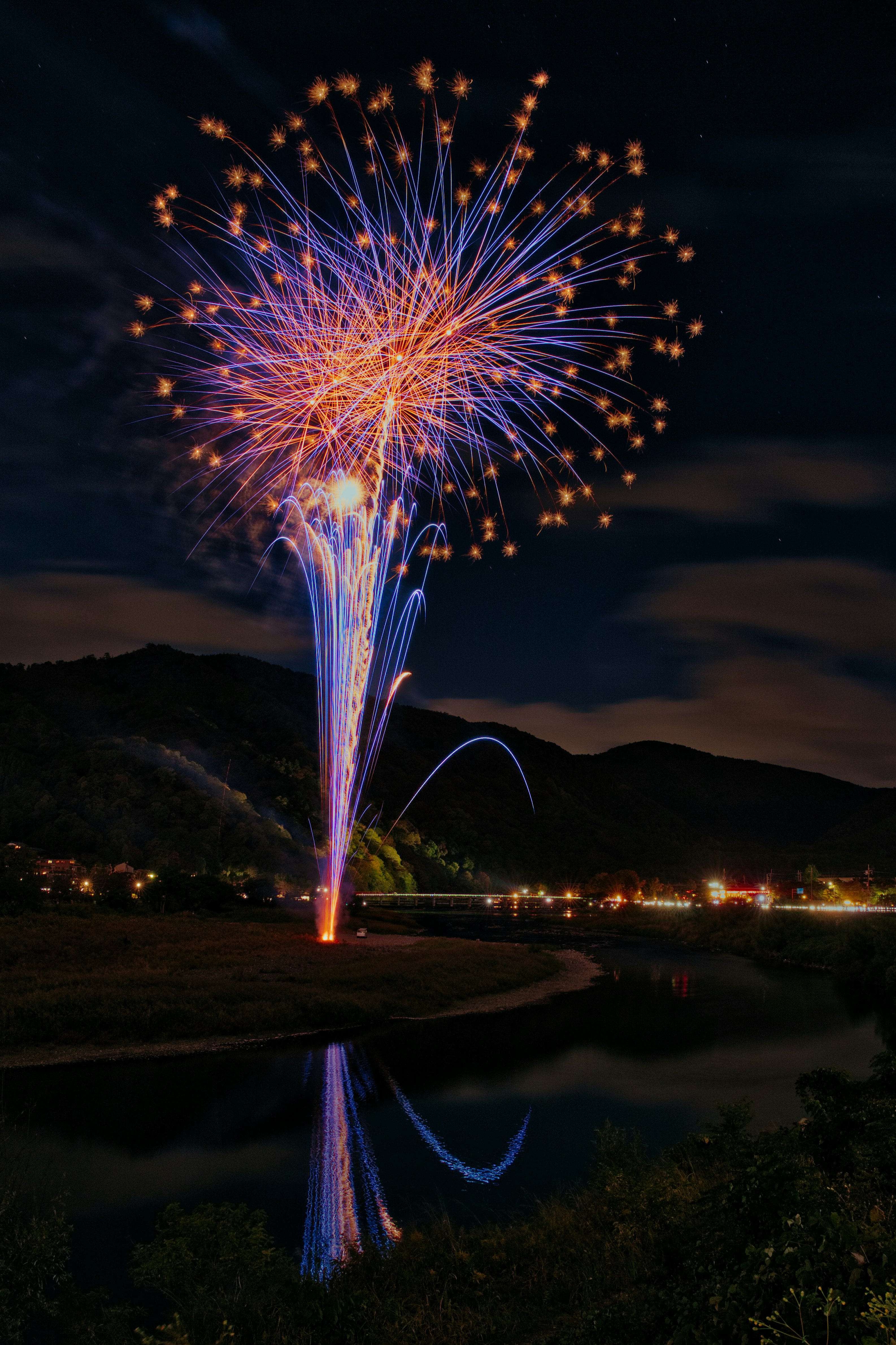 Night fireworks over Arashiyama near Togetsukyo Bridge