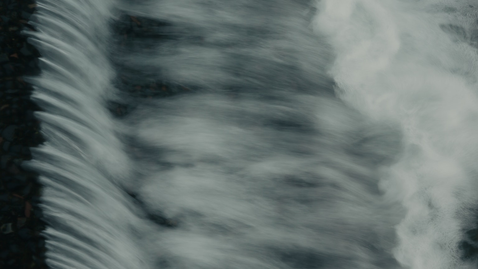 Close-up of flowing water with ripples and waves