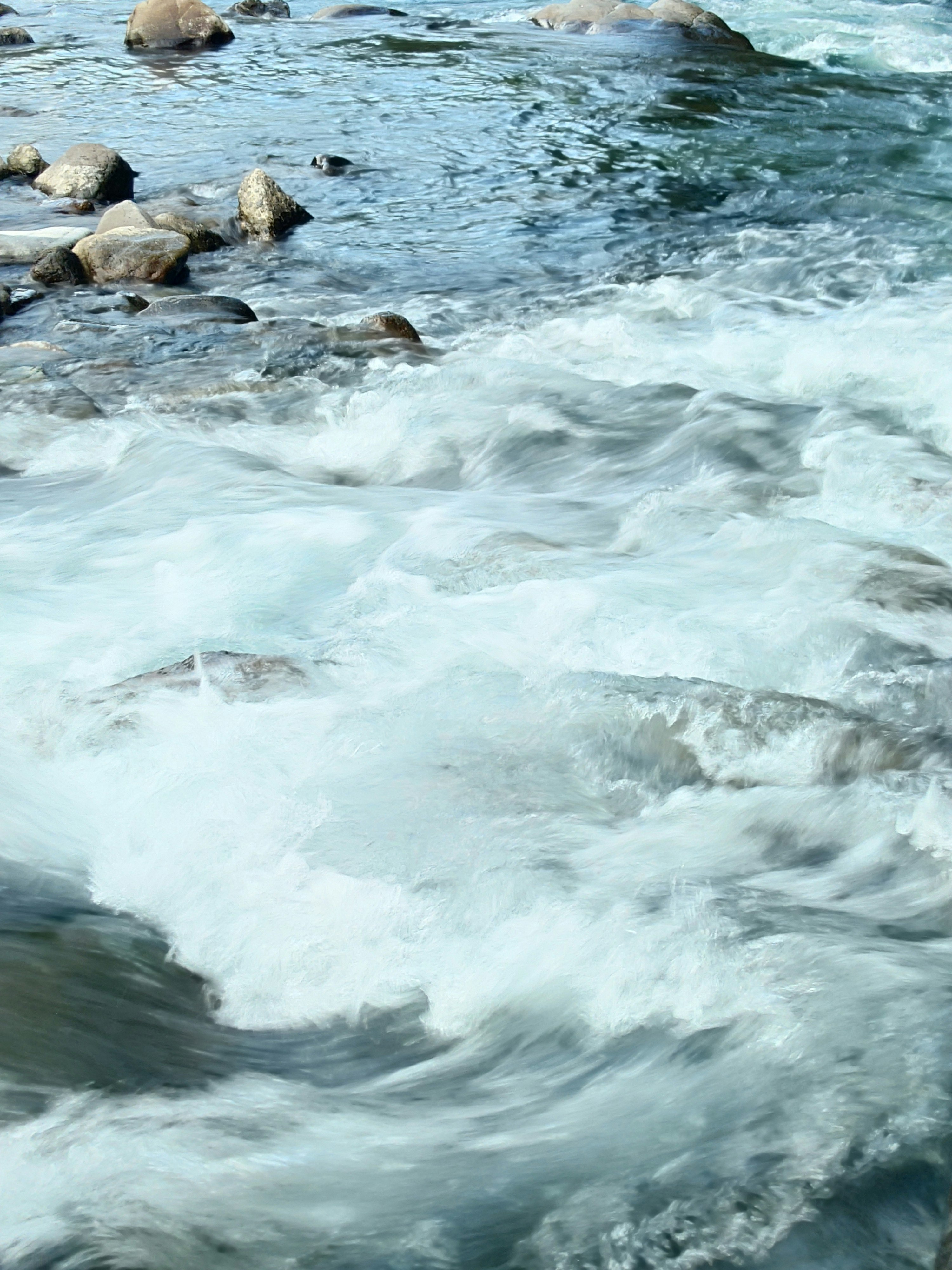 Sea waves crashing against rocks