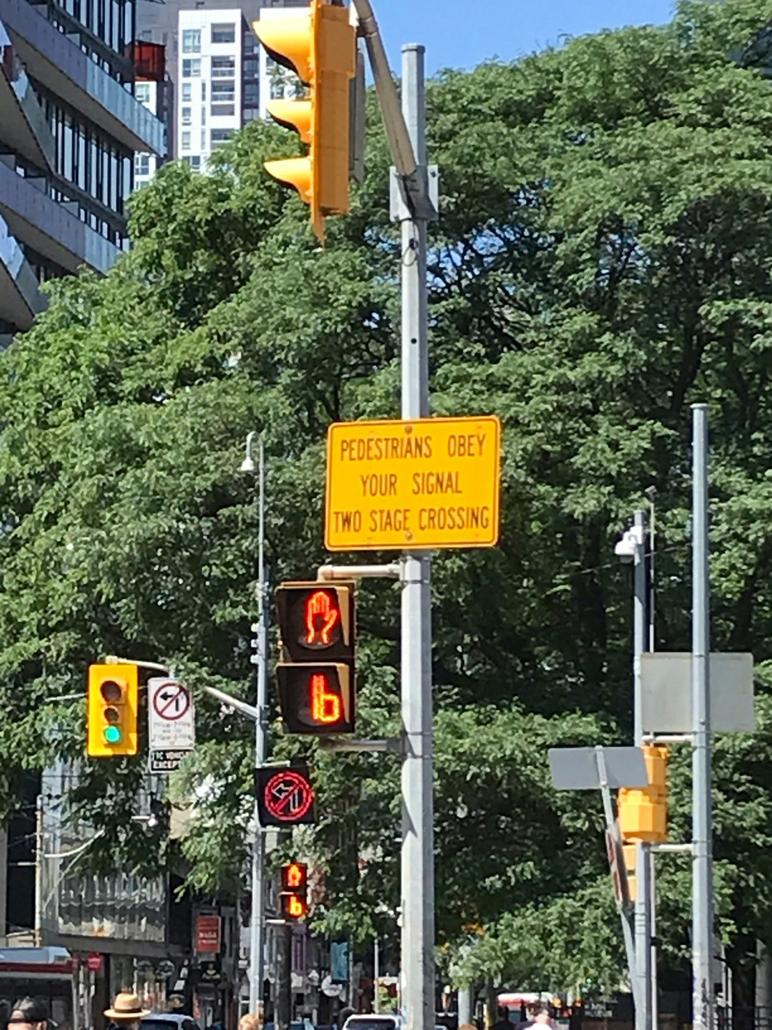 urban intersection with traffic lights and a pedestrian crossing