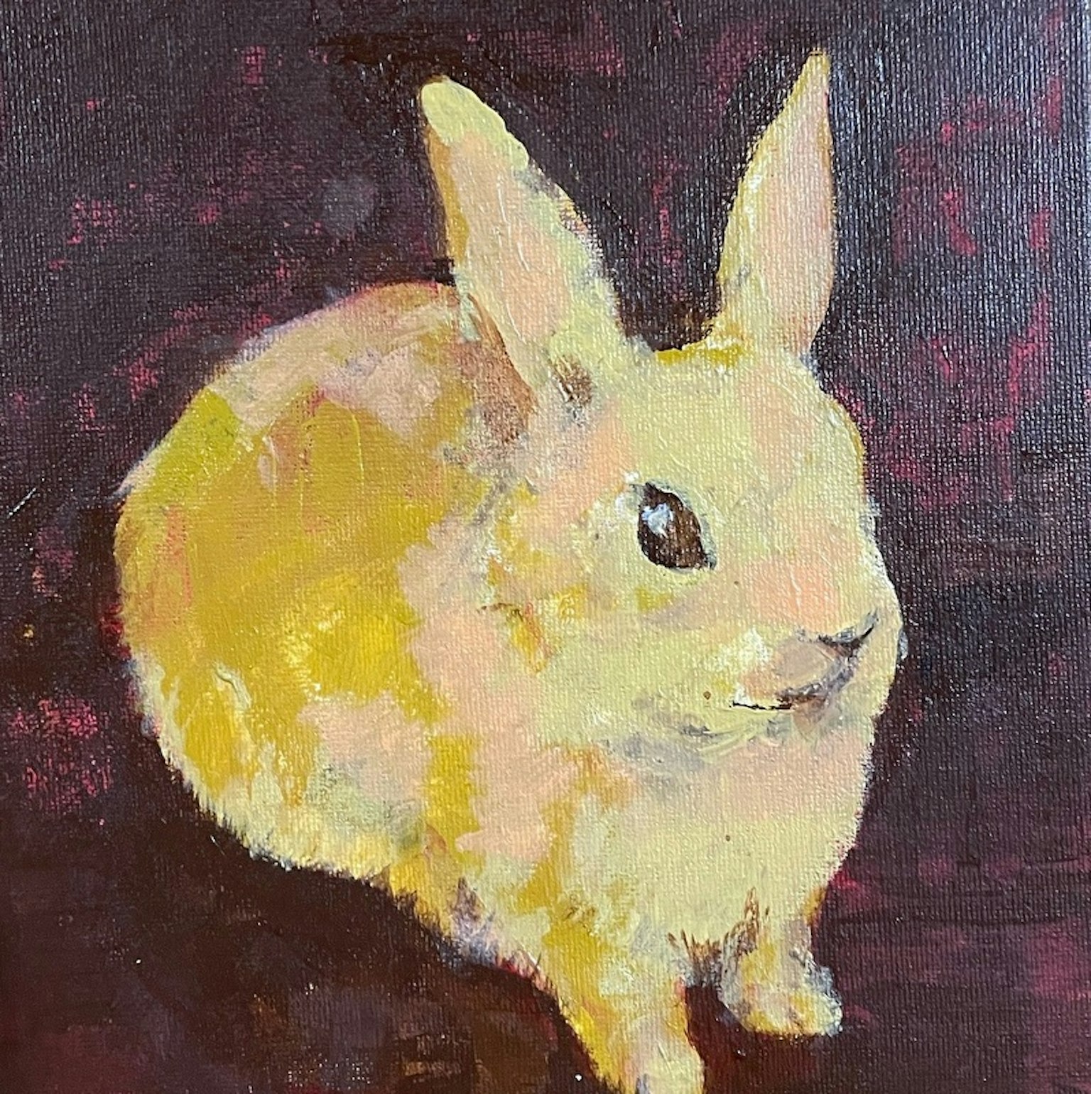 Peinture d'un lapin jaune avec des coups de pinceau doux