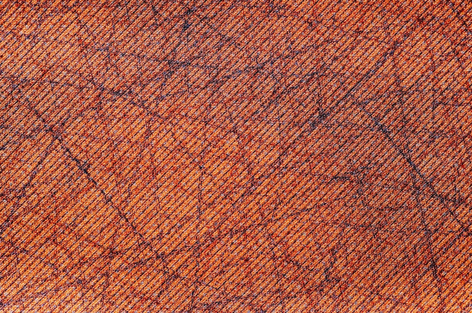 橙色表面特写，具有复杂的线条和纹理