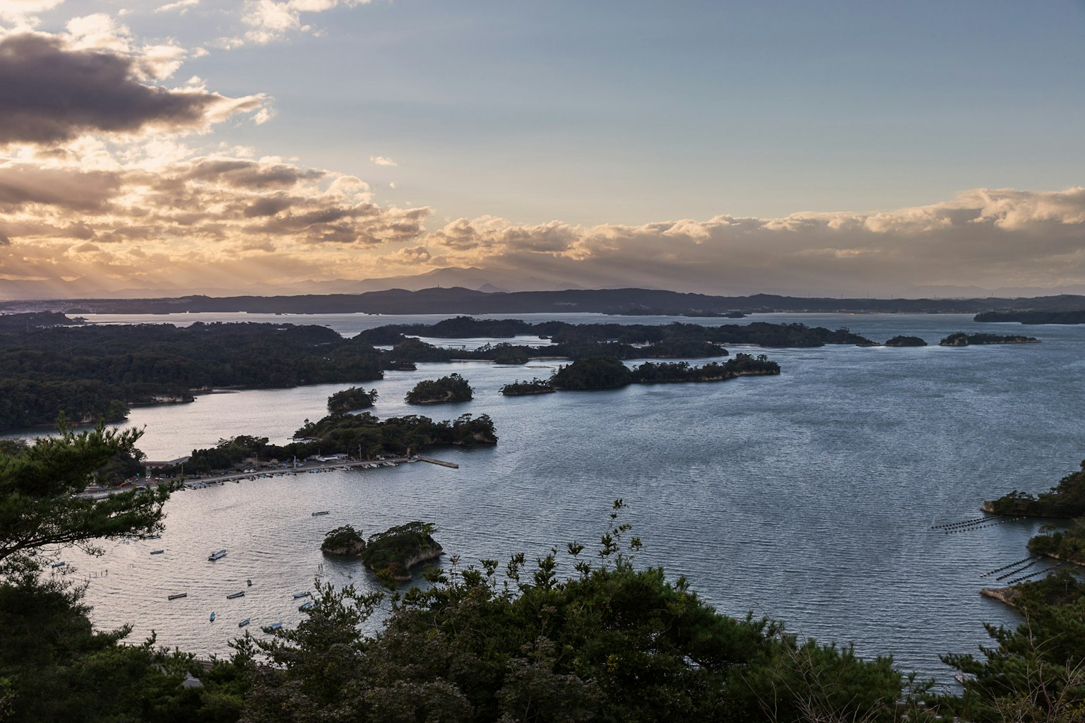 Beautiful landscape of sea and islands with sunset sky