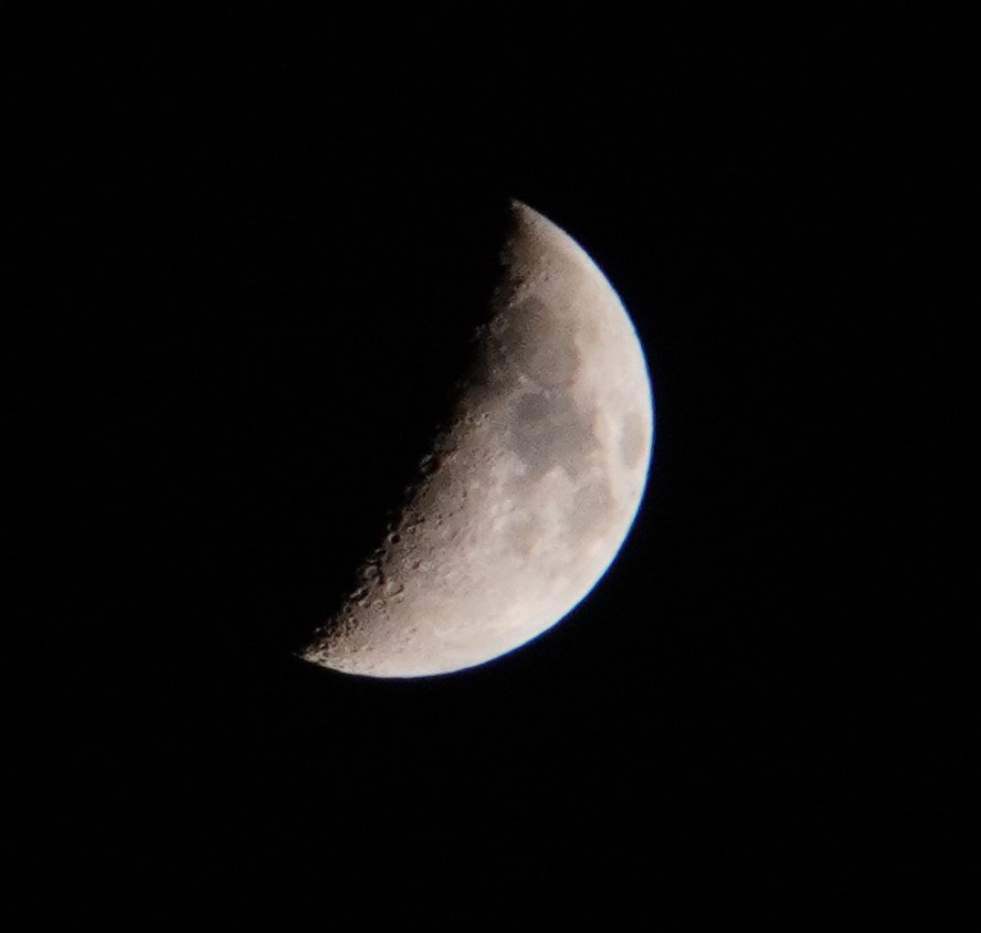 crescent moon against a dark sky