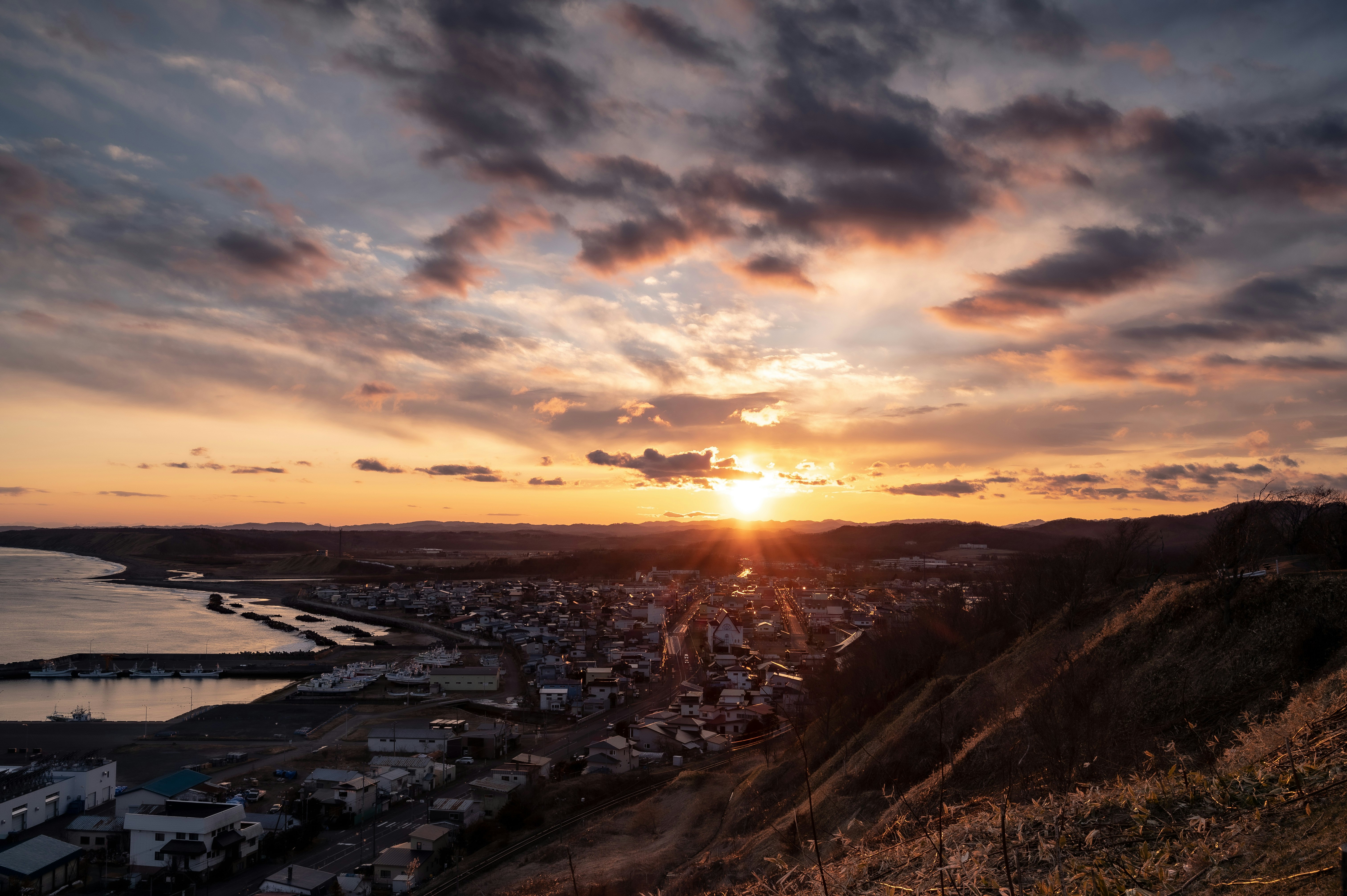 sunset view over a coastal town and bay
