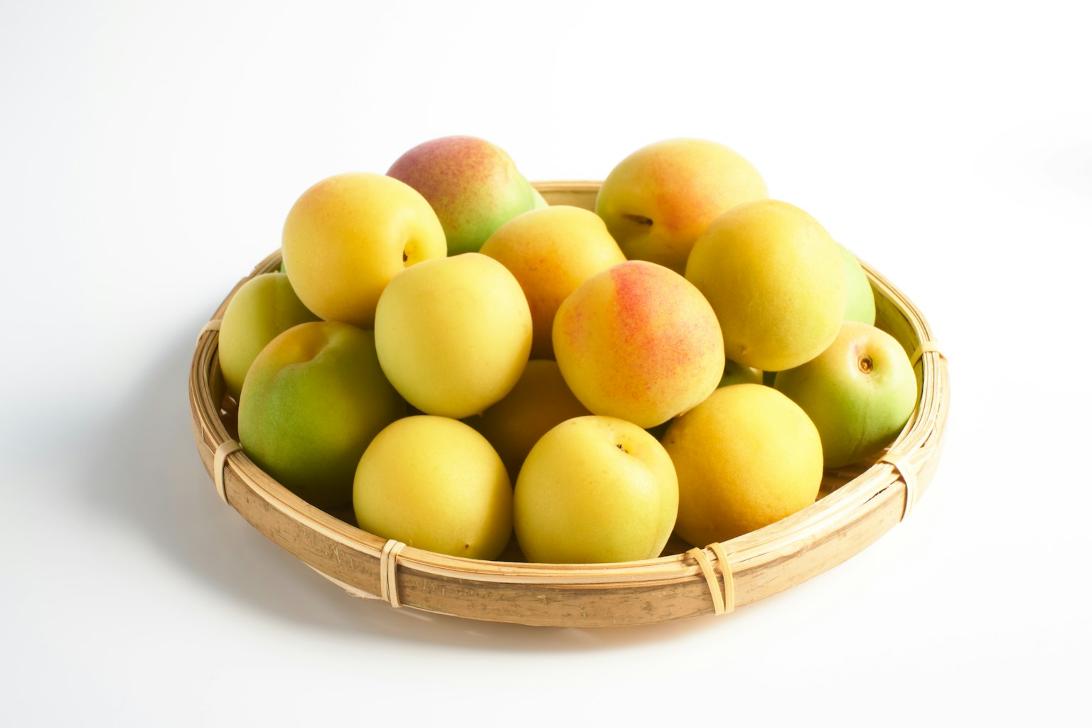 A basket filled with colorful fruits