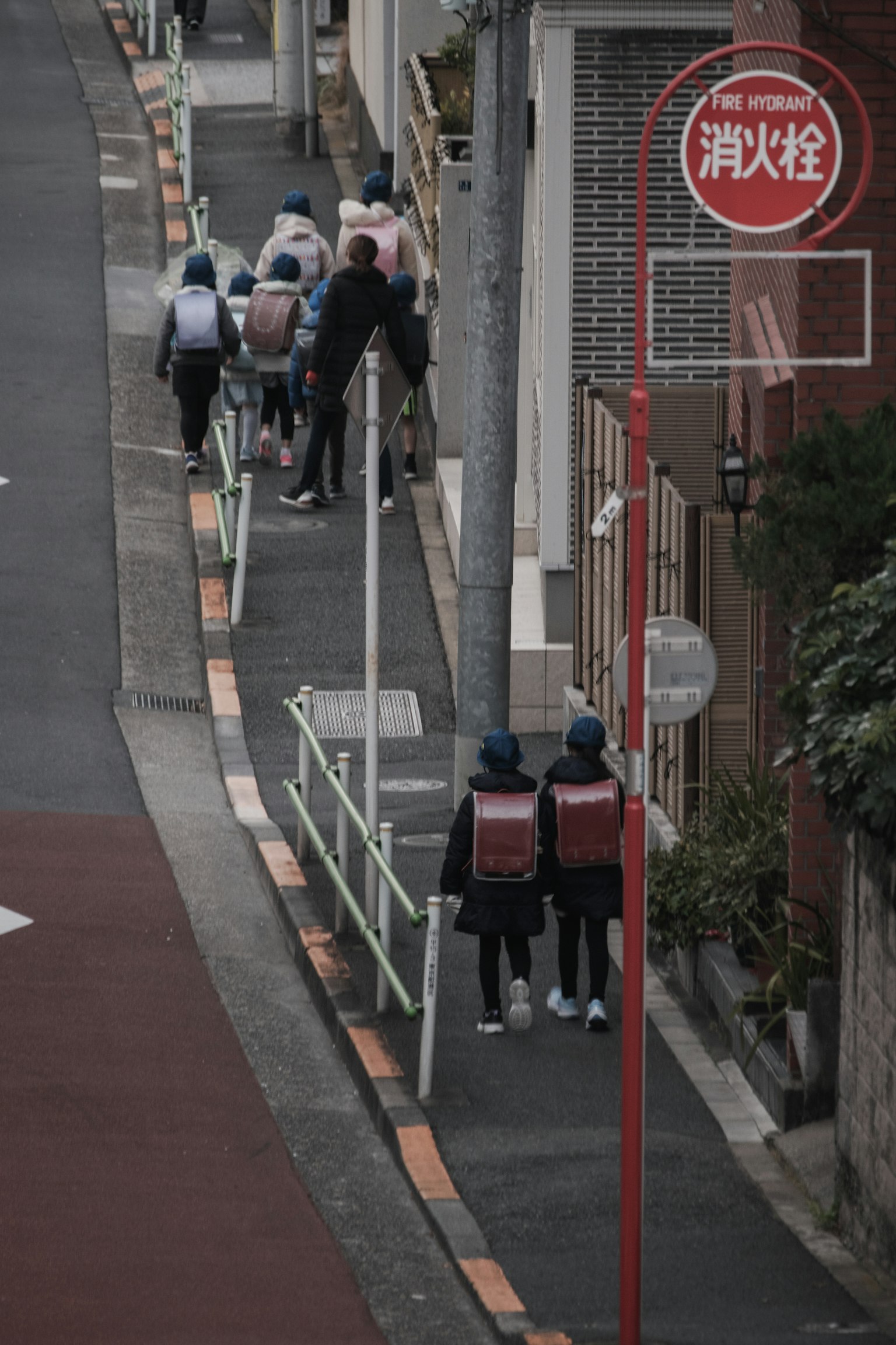 Photo of a group of students walking on a street