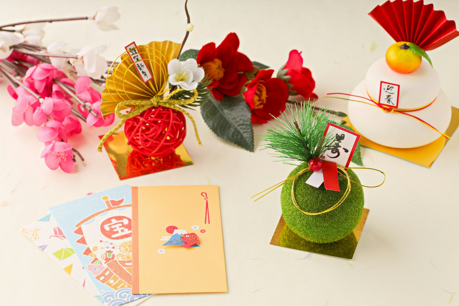 Colorful decorative items and celebration cards arranged on a table