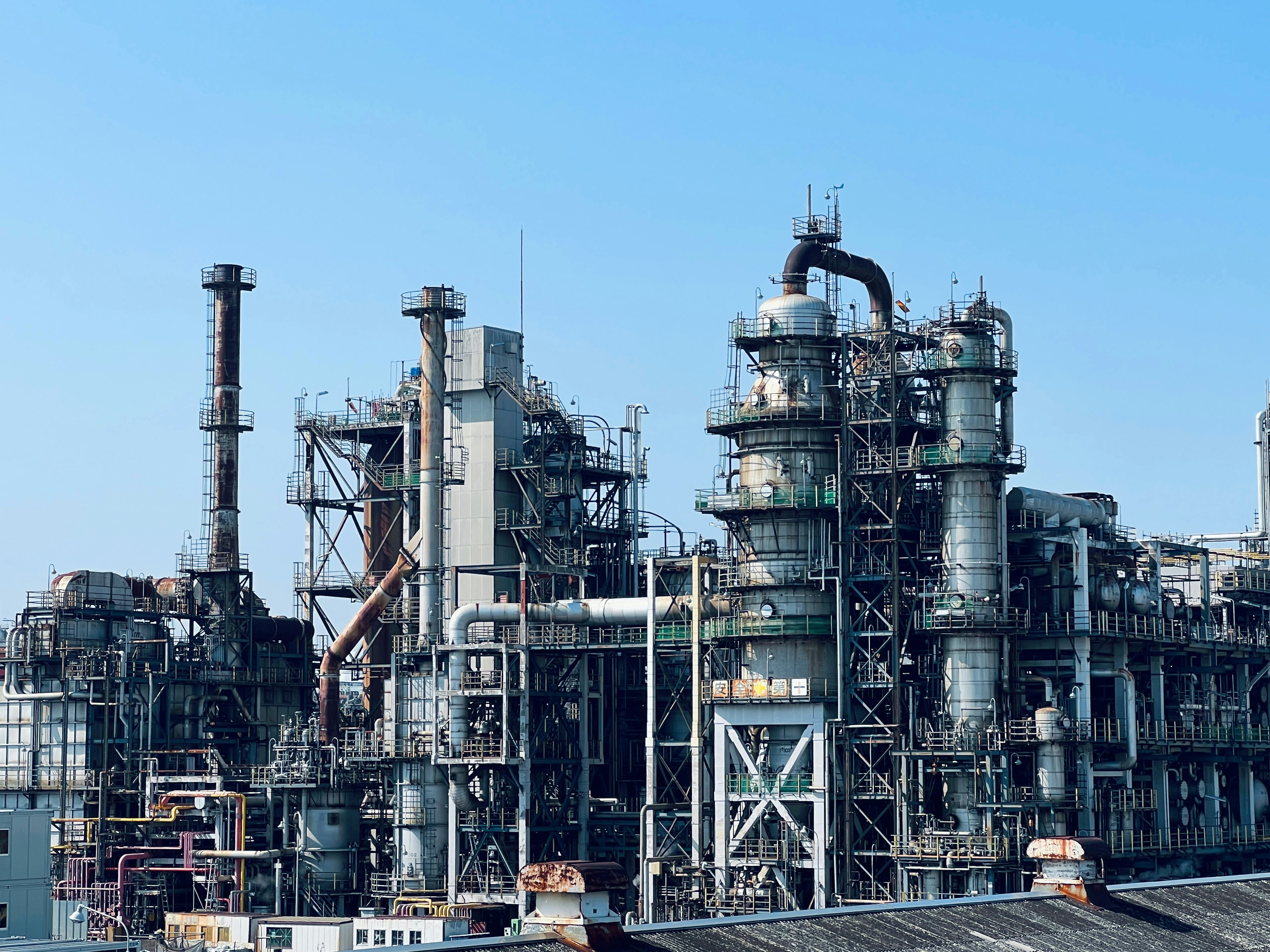 industrial plant with pipes and storage tanks