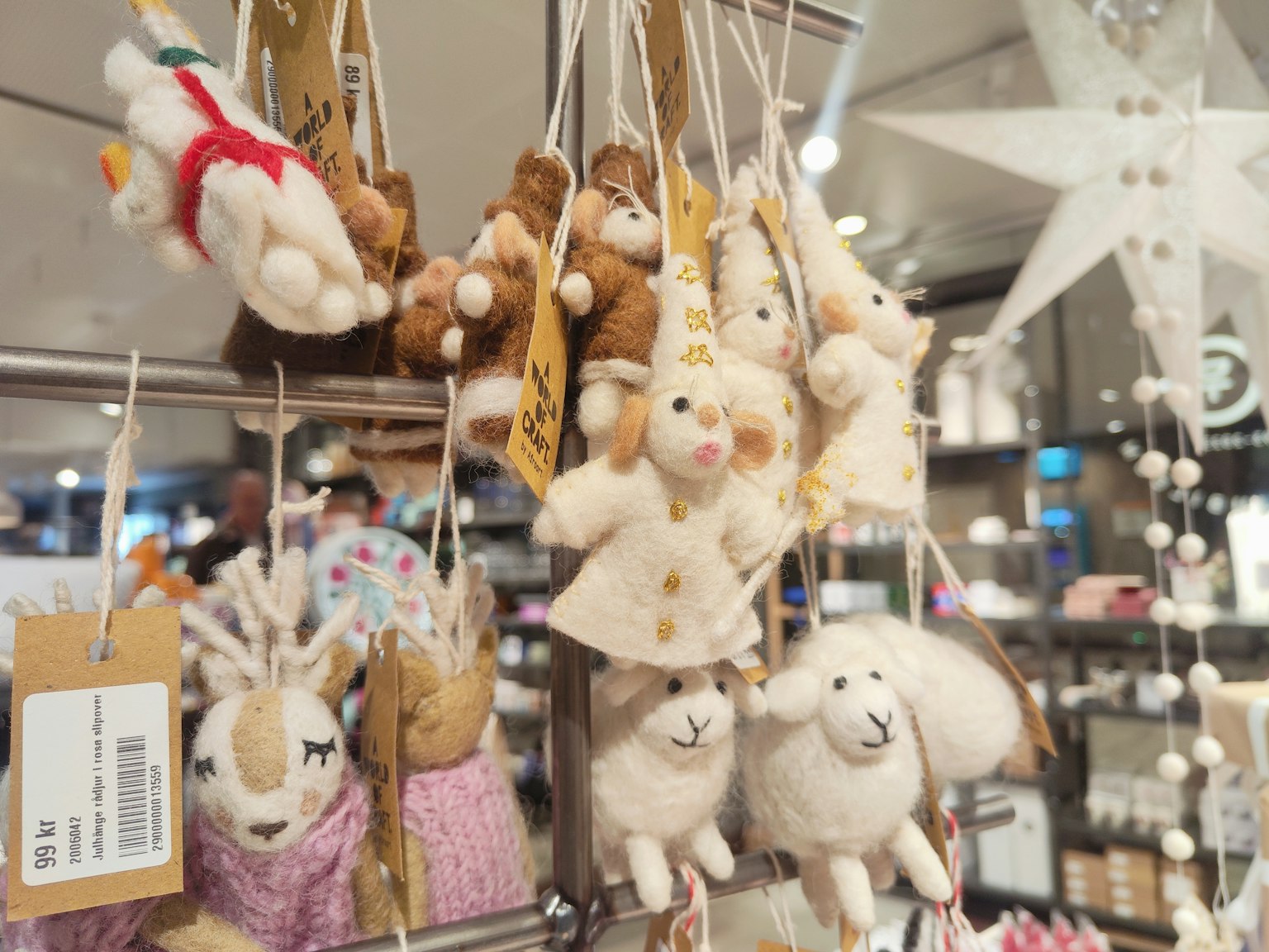 Cute animal plush toys hanging on a display
